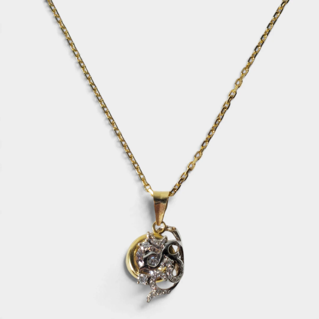 Colgante y cadena en oro de 18 quilates y diamantes.