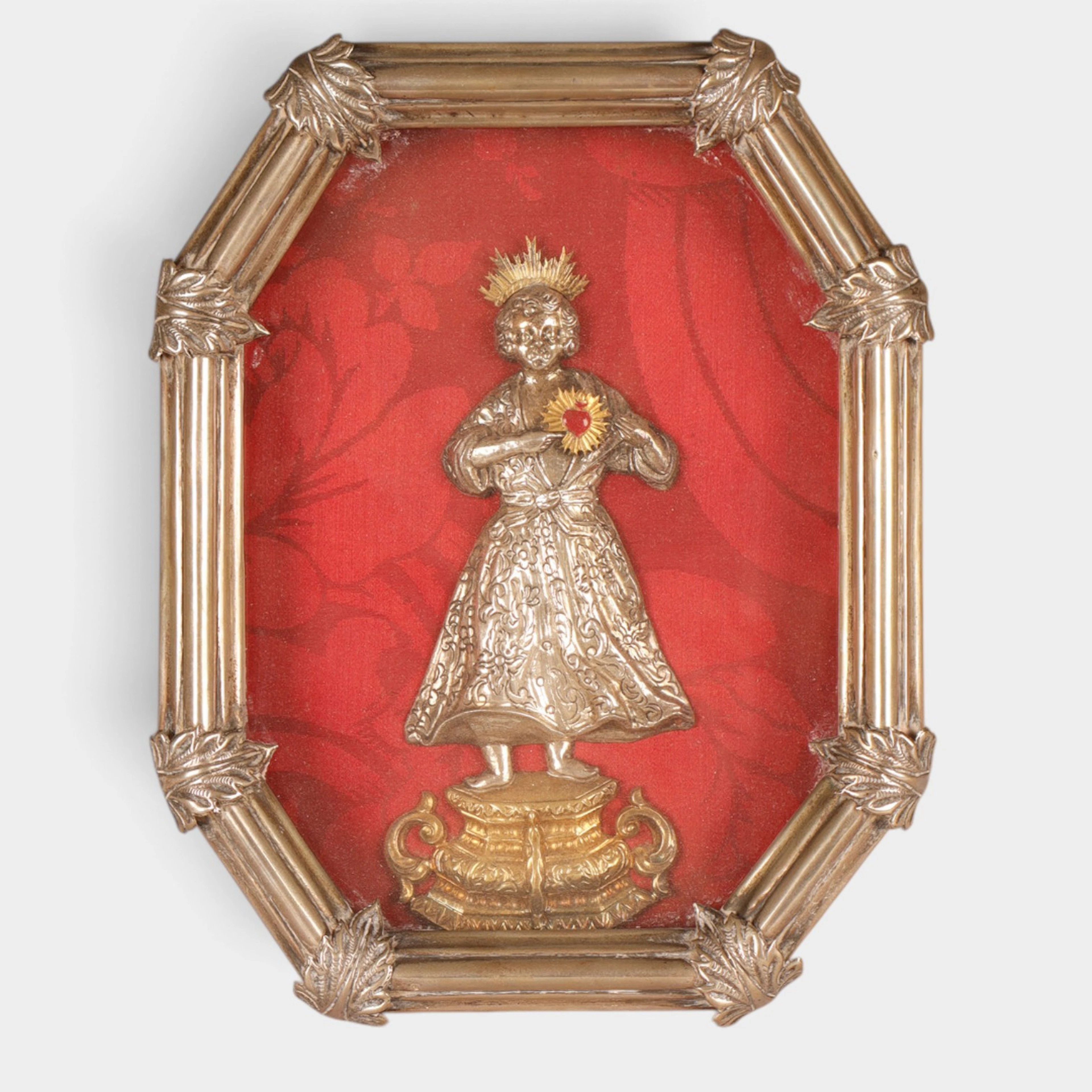 Imagen del Sagrado Corazón de Jesús en plata, del siglo XX.