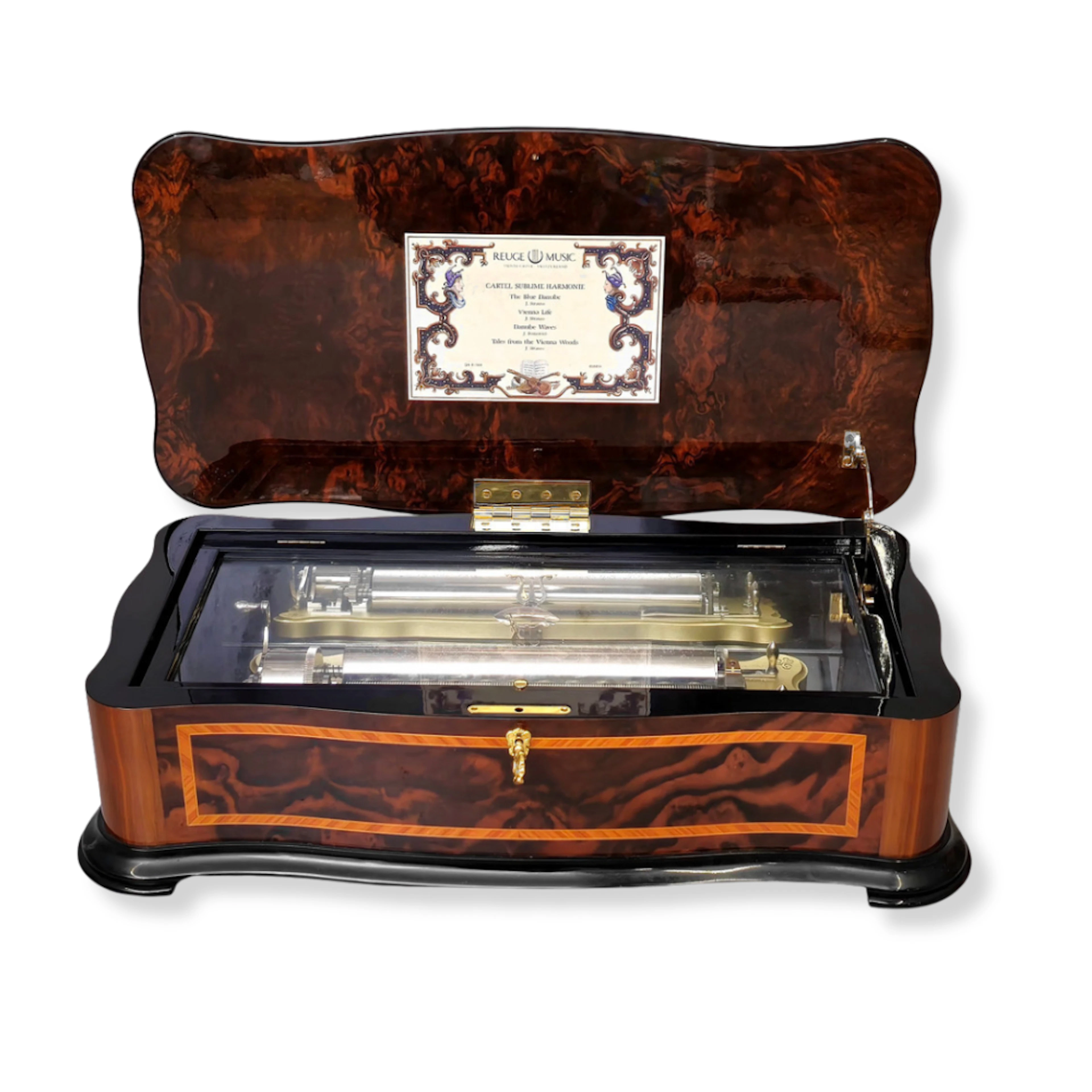 CAJA DE MUSICA REUGE. 4 MELODIAS.SAINTE-CROIX. SUIZA. MADERA DE RAIZ