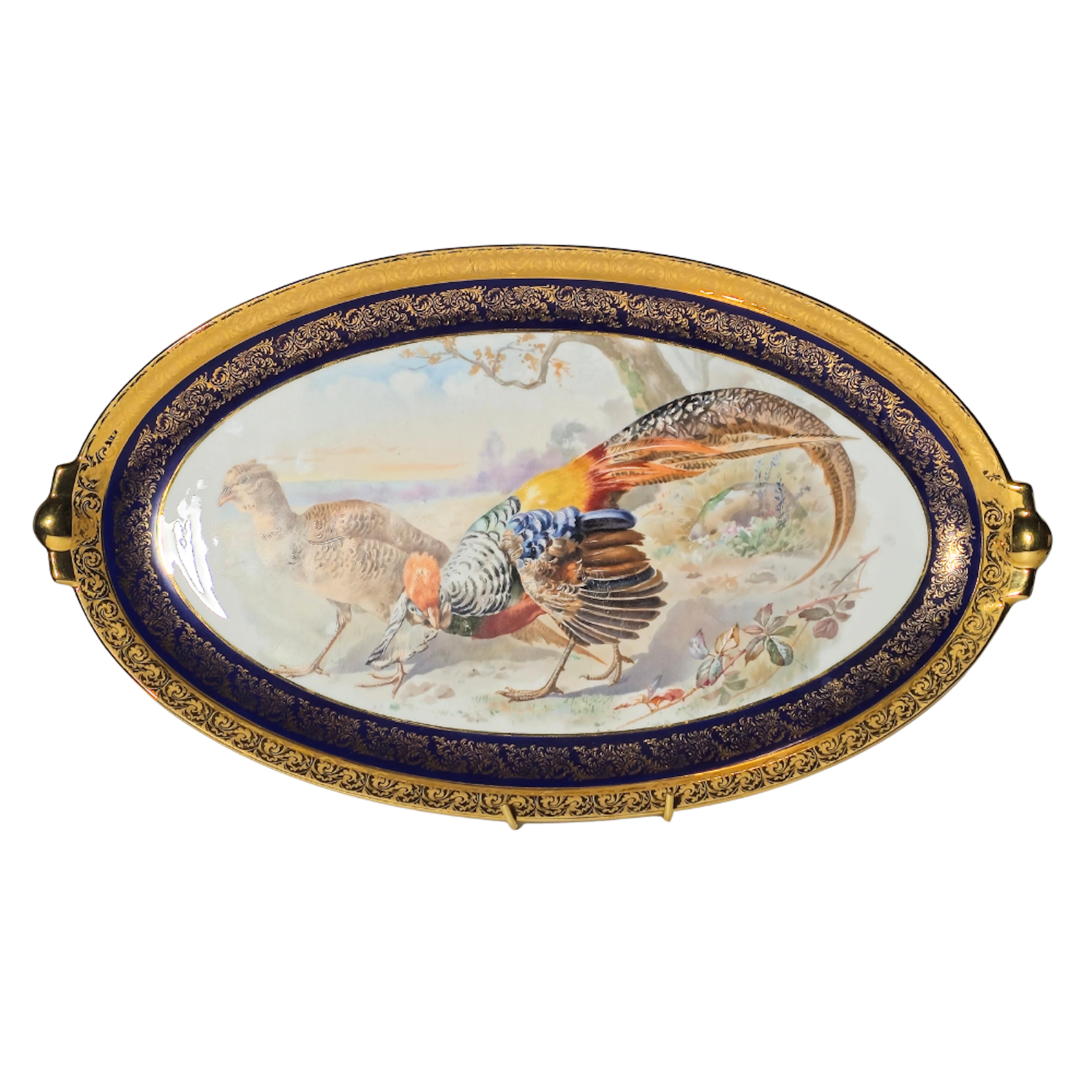 GRAN BANDEJA EN PORCELANA DE LIMOGES. FAISAN Y PERDIZ.