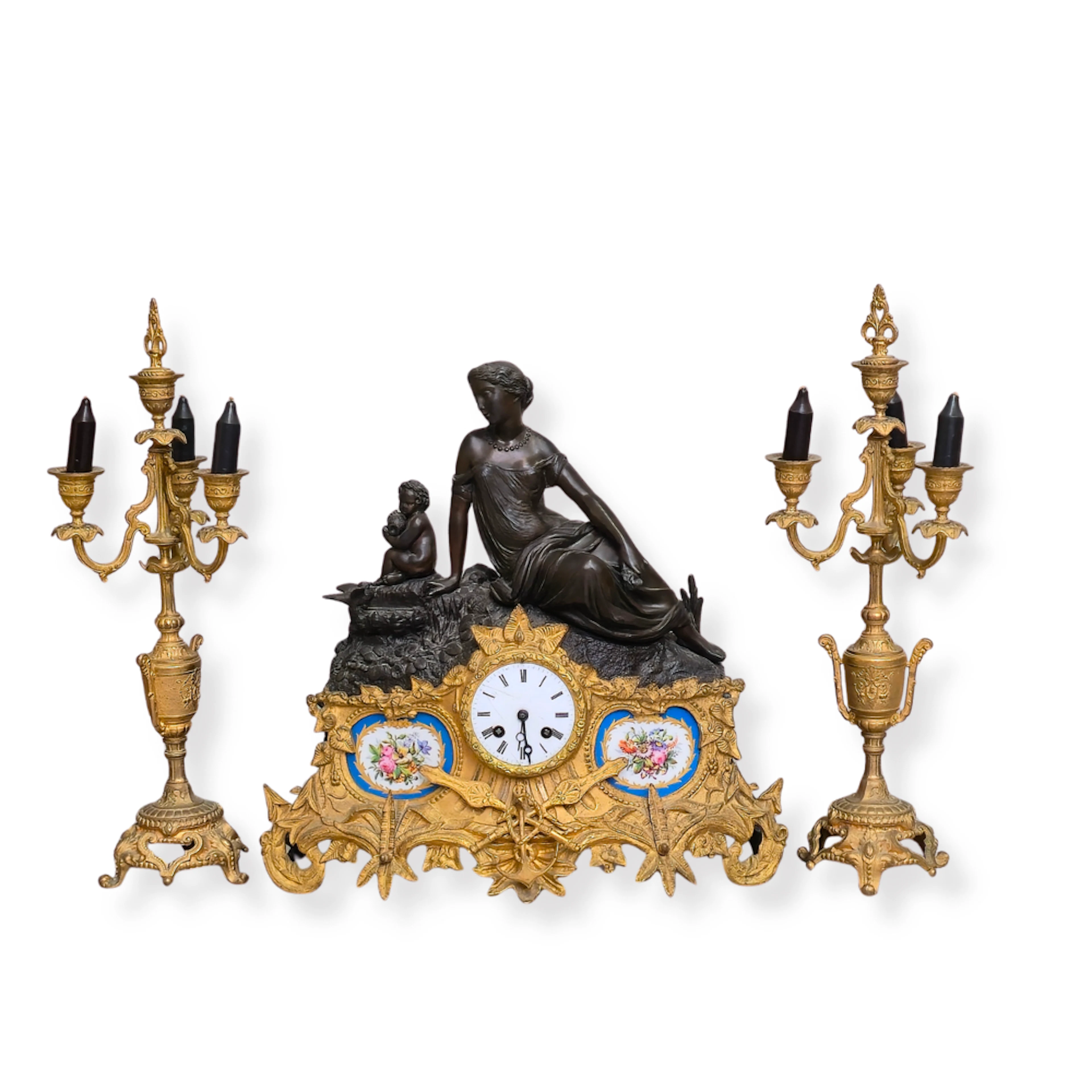 RELOJ FRANCES CON GUARNICION. PLACAS DE PORCELANA. NAPOLEÓN. SIGLO XIX.