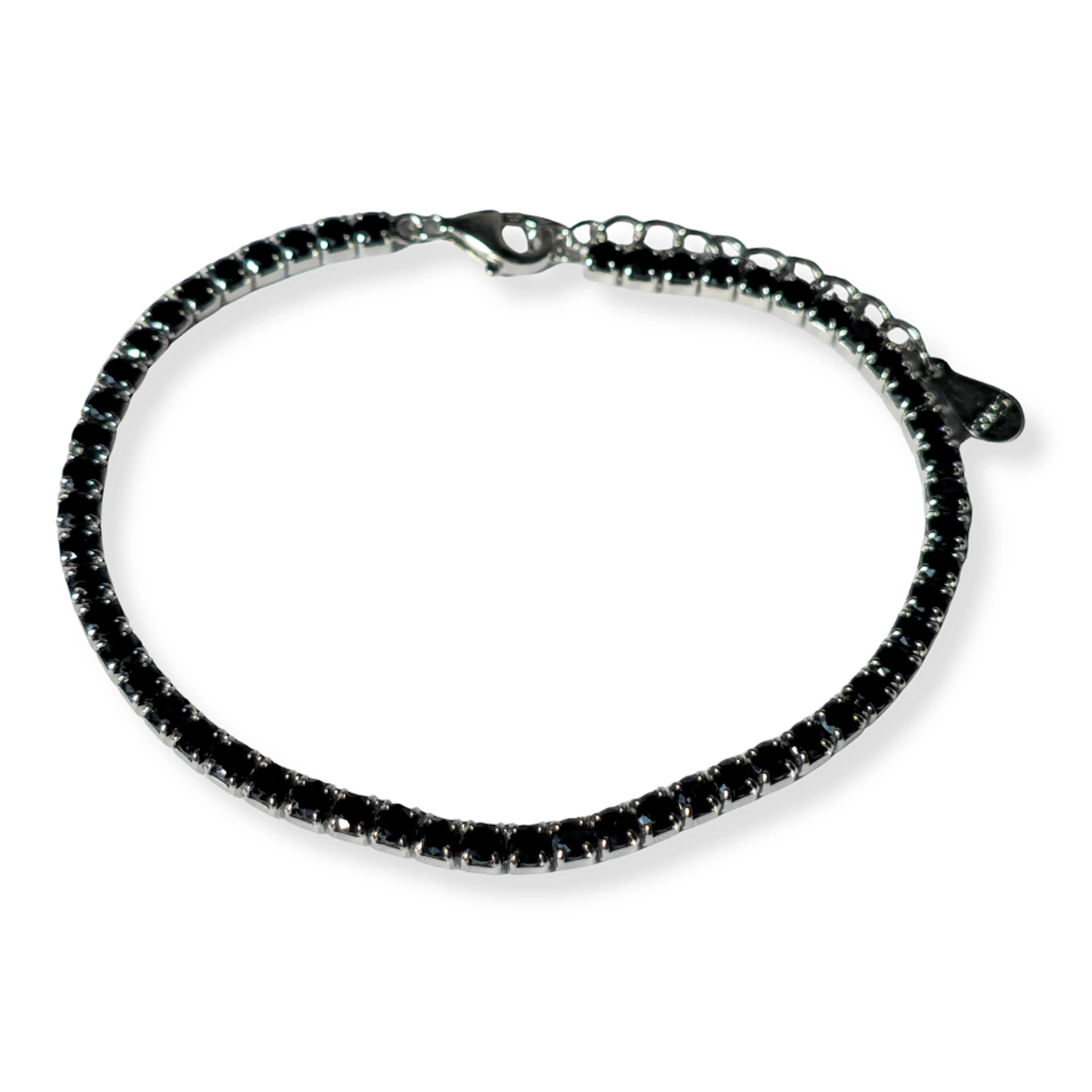 Pulsera riviere en plata rodiada con circonitas negras.