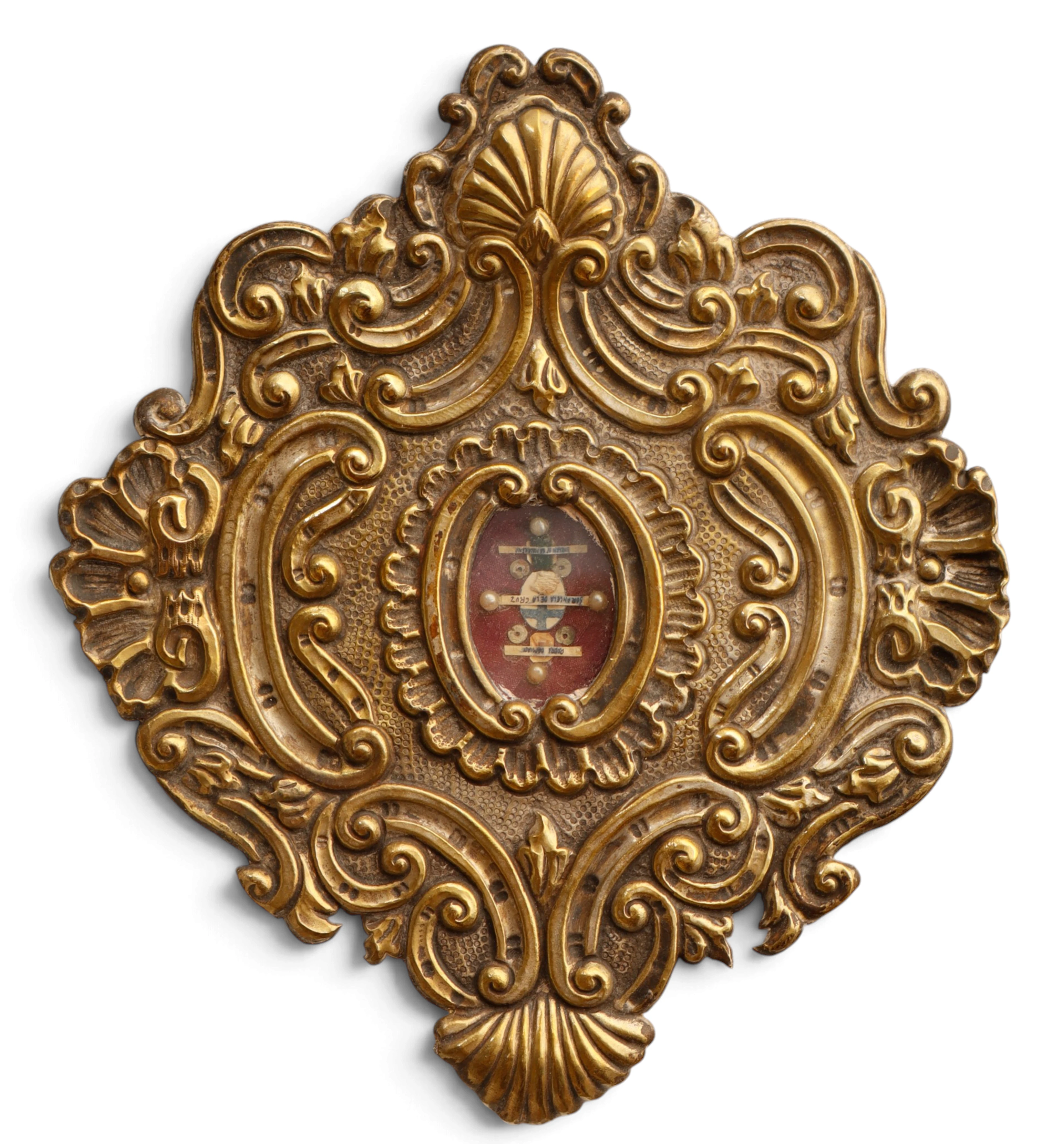 Placa relicario sevillana en metal plateado, del siglo XX.