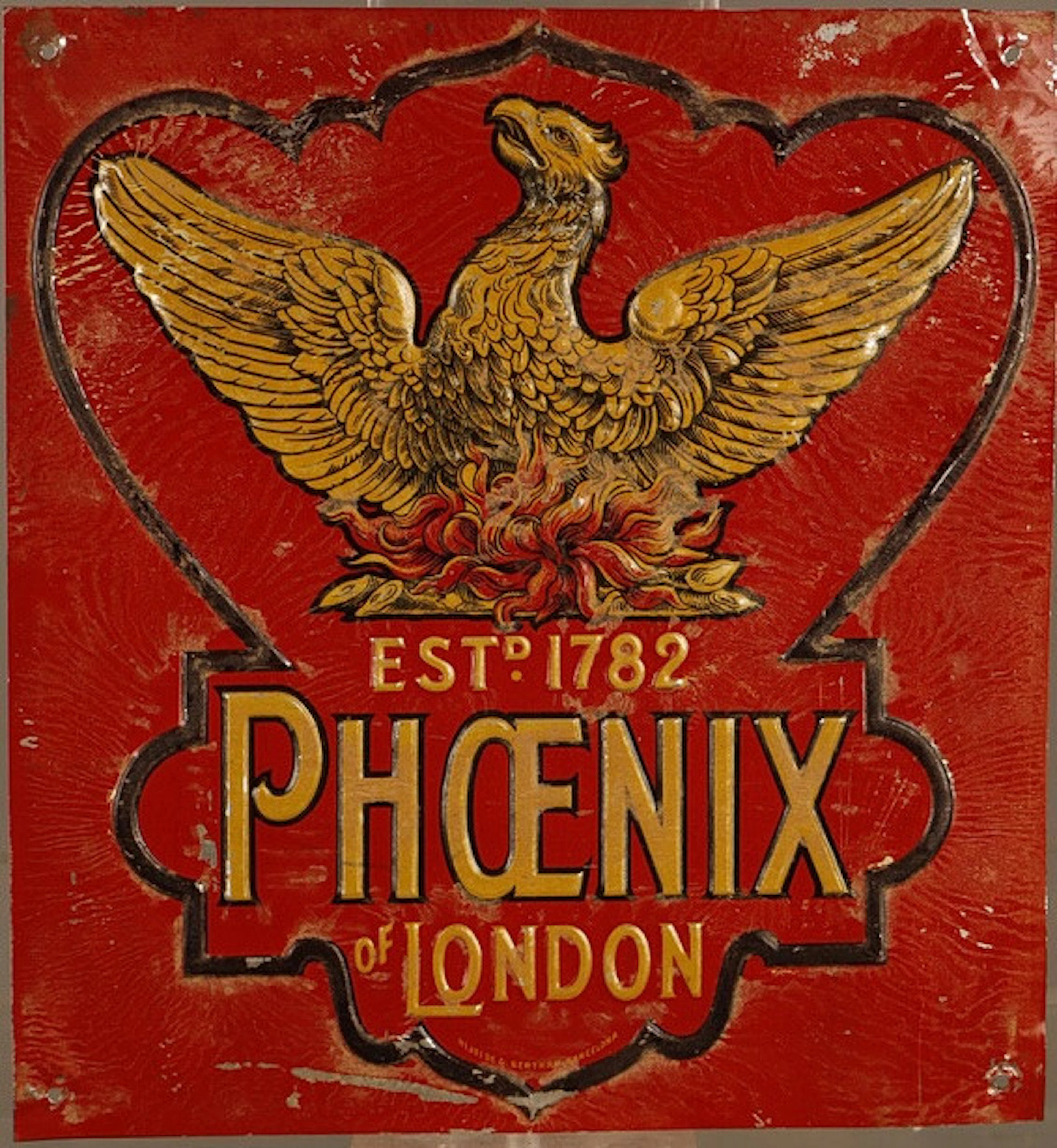 Phoenix, placa publicitaria en hojalata estampada y pintada.