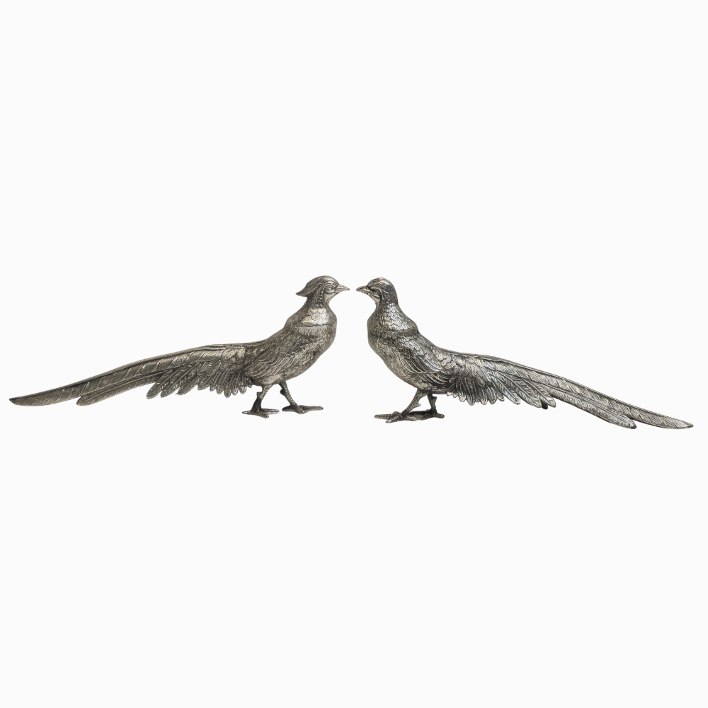 Dos faisanes en plata española punzonada.