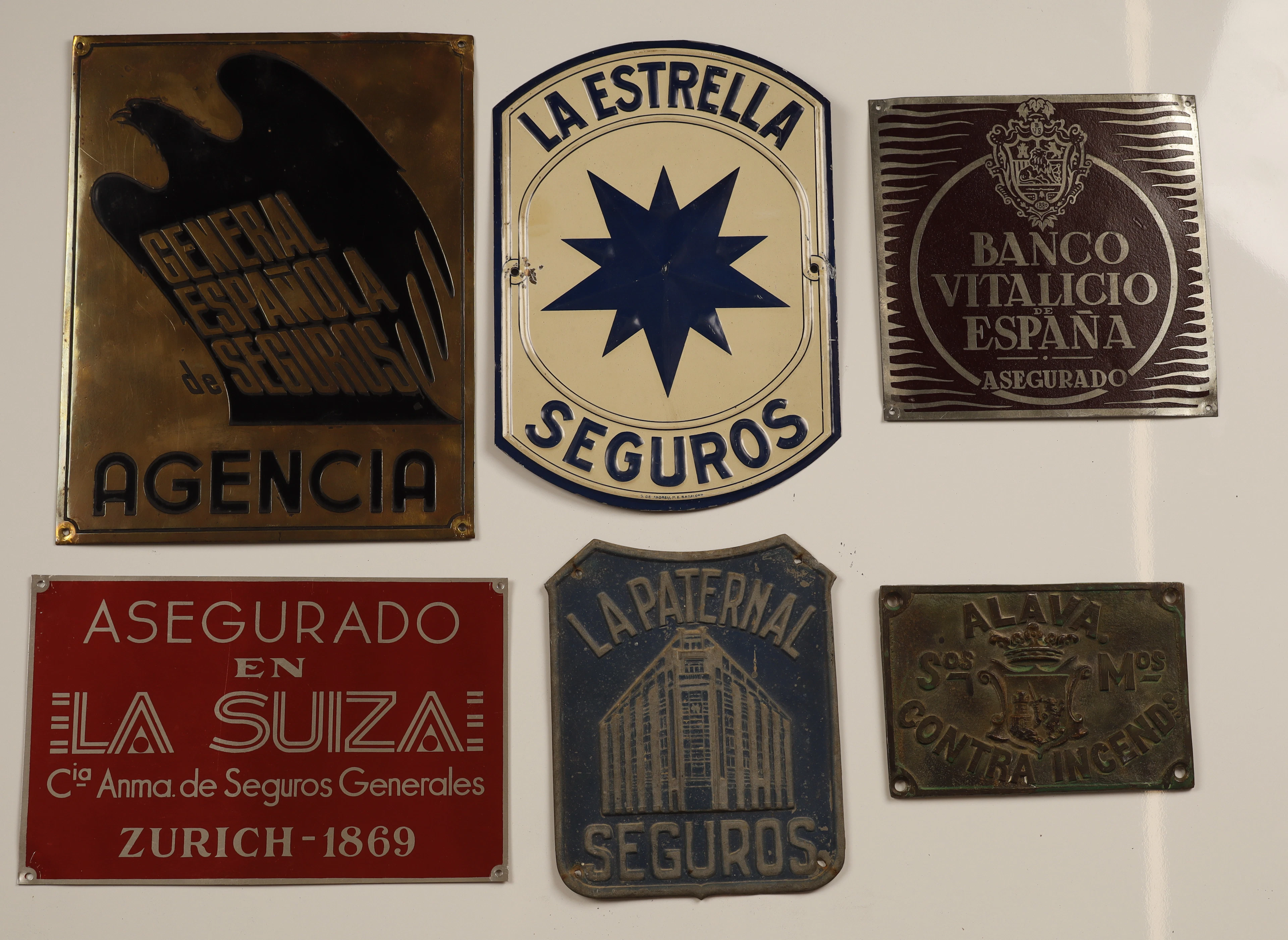 La Paternal y otros, 6 placas publicitarias en latón, zinc y hojalata