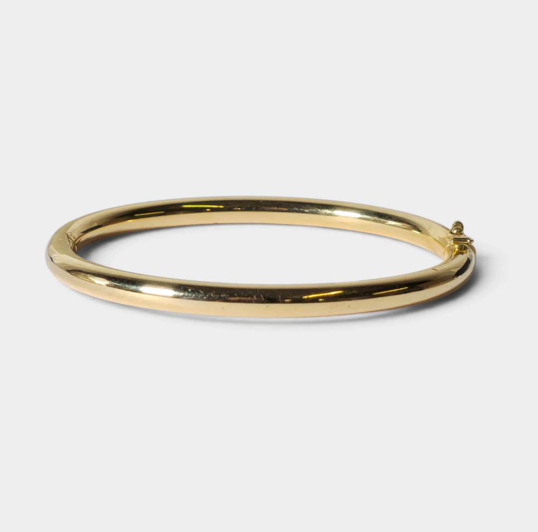 Brazalete, pulsera esclava en oro amarillo de 18 K.