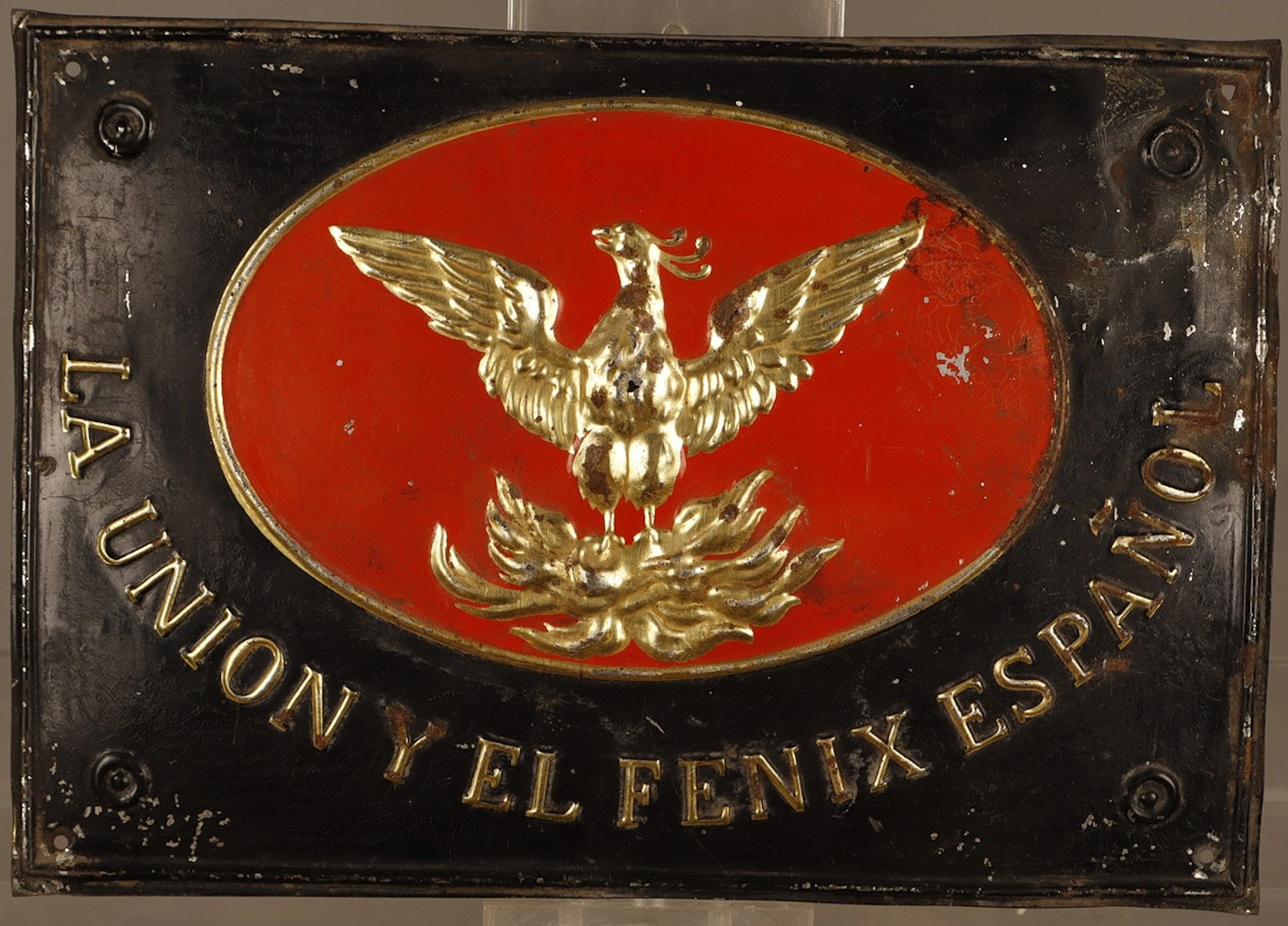 La Unión y el Fénix Español, placa publicitaria en hojalata estampada