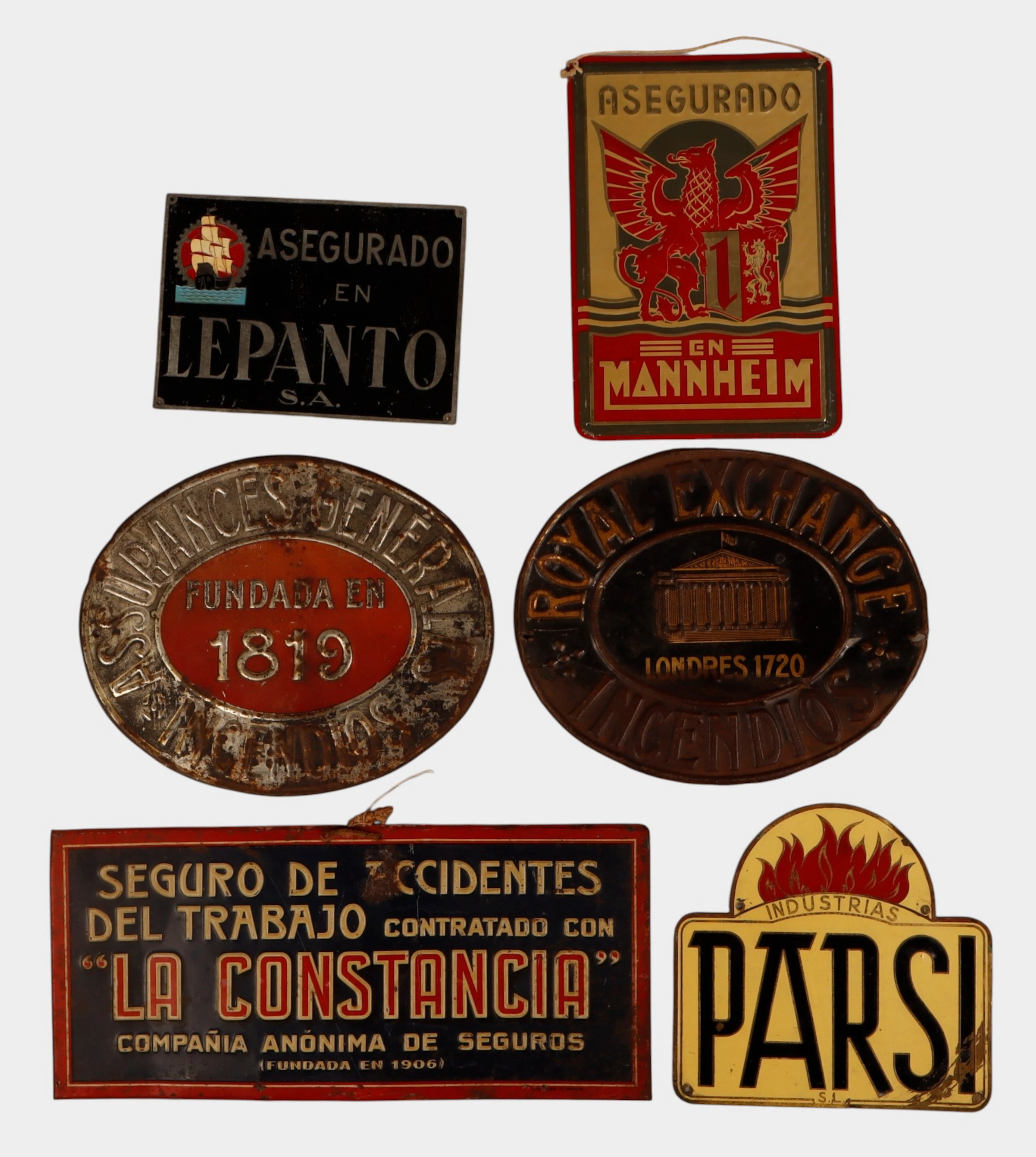 La Constancia y otros, seis placas de seguros en chapa.