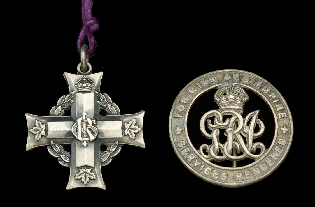 Canadian Memorial Cross, G.V.R. (402162. Pte. H. F. Morris.); together