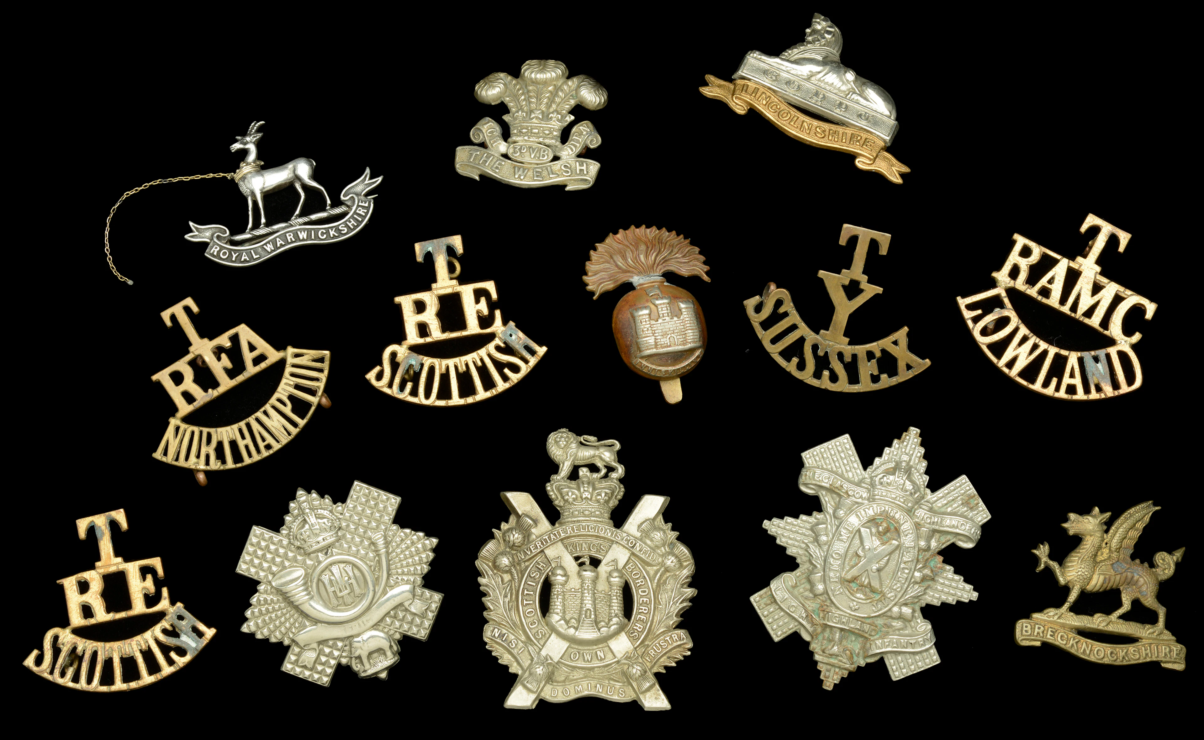 Assorted Badges with damage and at fault fittings. A selection of