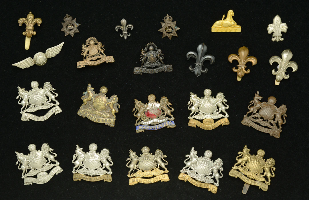 Manchester Regiment, Assorted Cap Badges. A very good selection, with