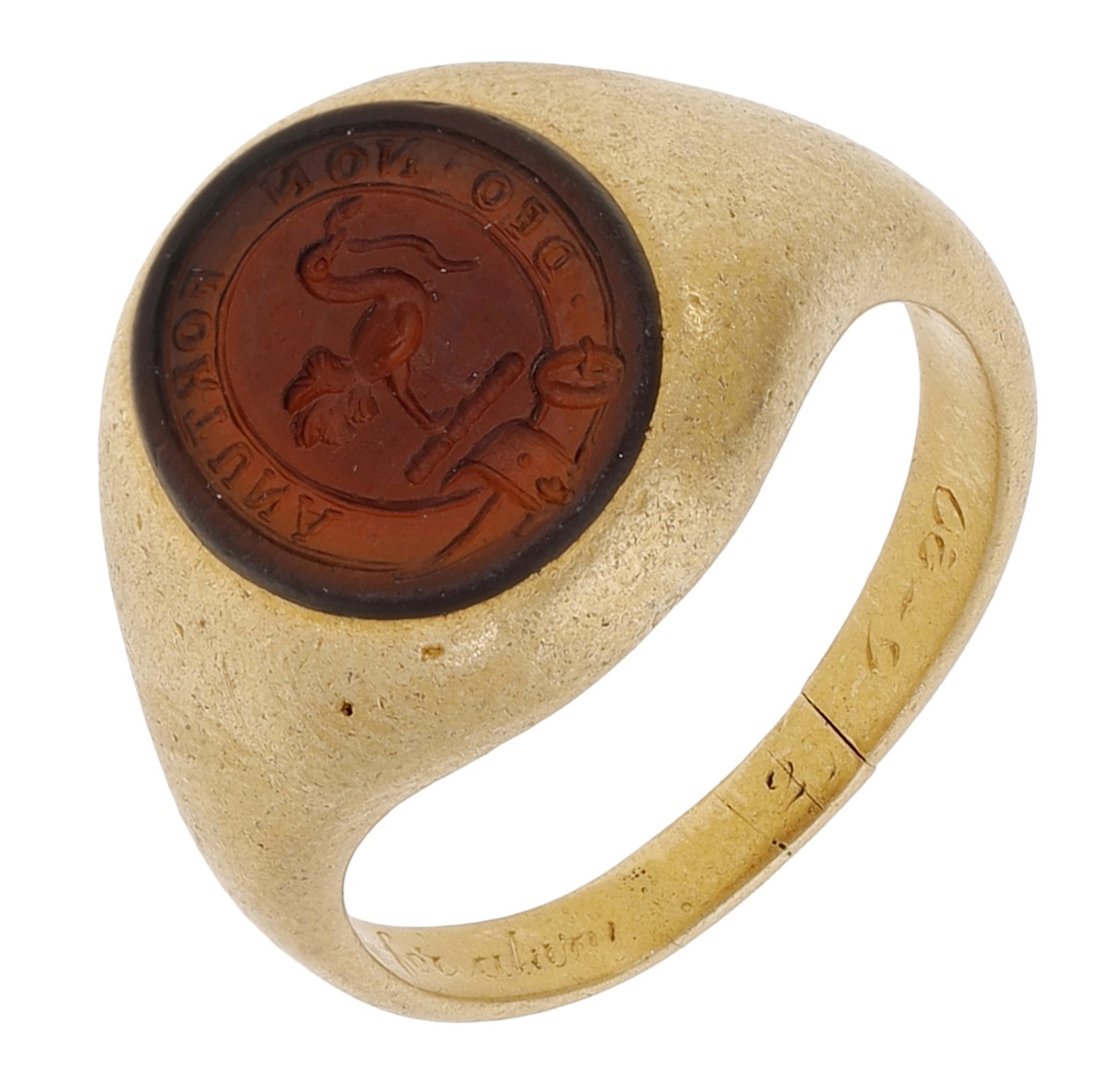 A carnelian intaglio signet ring, carved to depict a crest, an ostrich