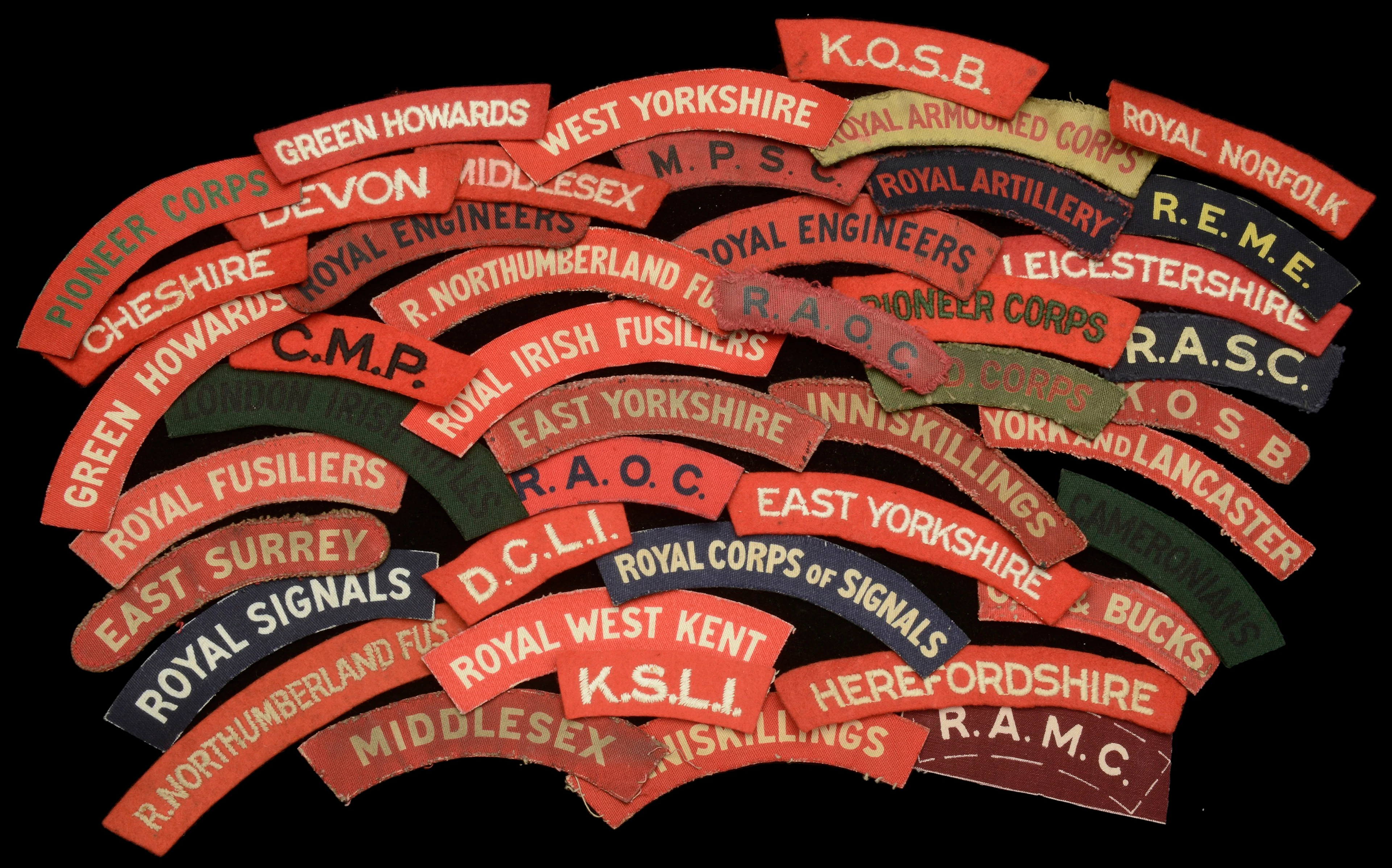 Assorted Cloth Regimental printed and glue backed Shoulder Titles.