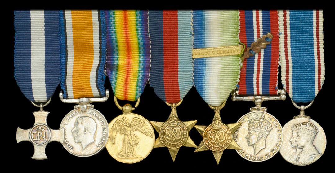 A Second War D.S.C mounted group of seven miniature dress medals attributed