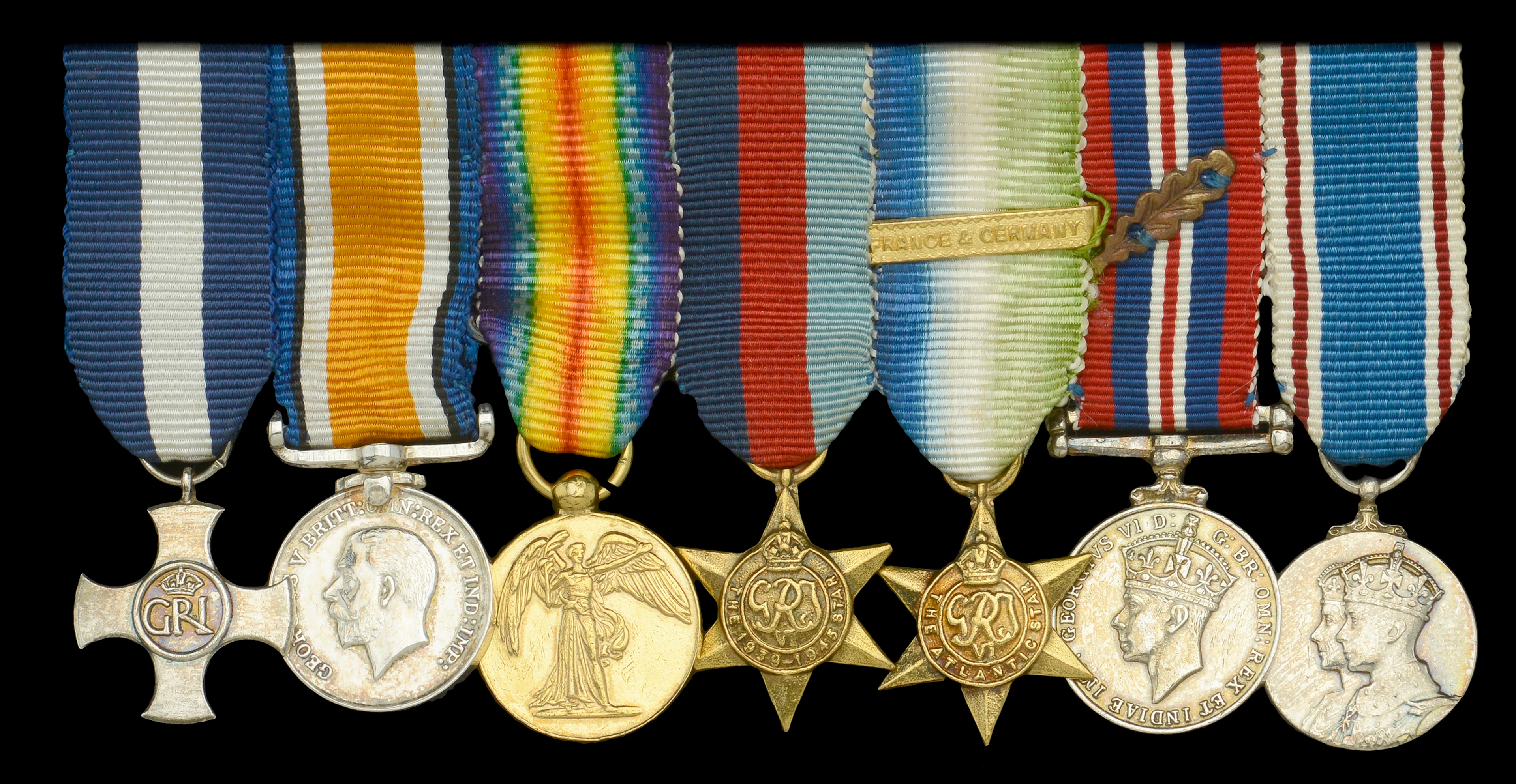 A Second War D.S.C mounted group of seven miniature dress medals attributed