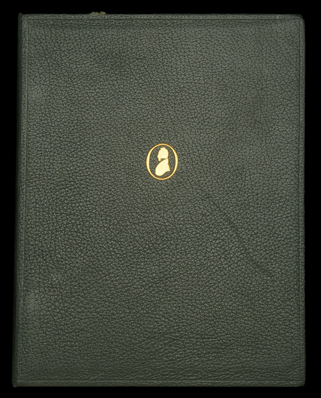 A dark-green Thomas De La Rue album, formerly housing all the previously-listed