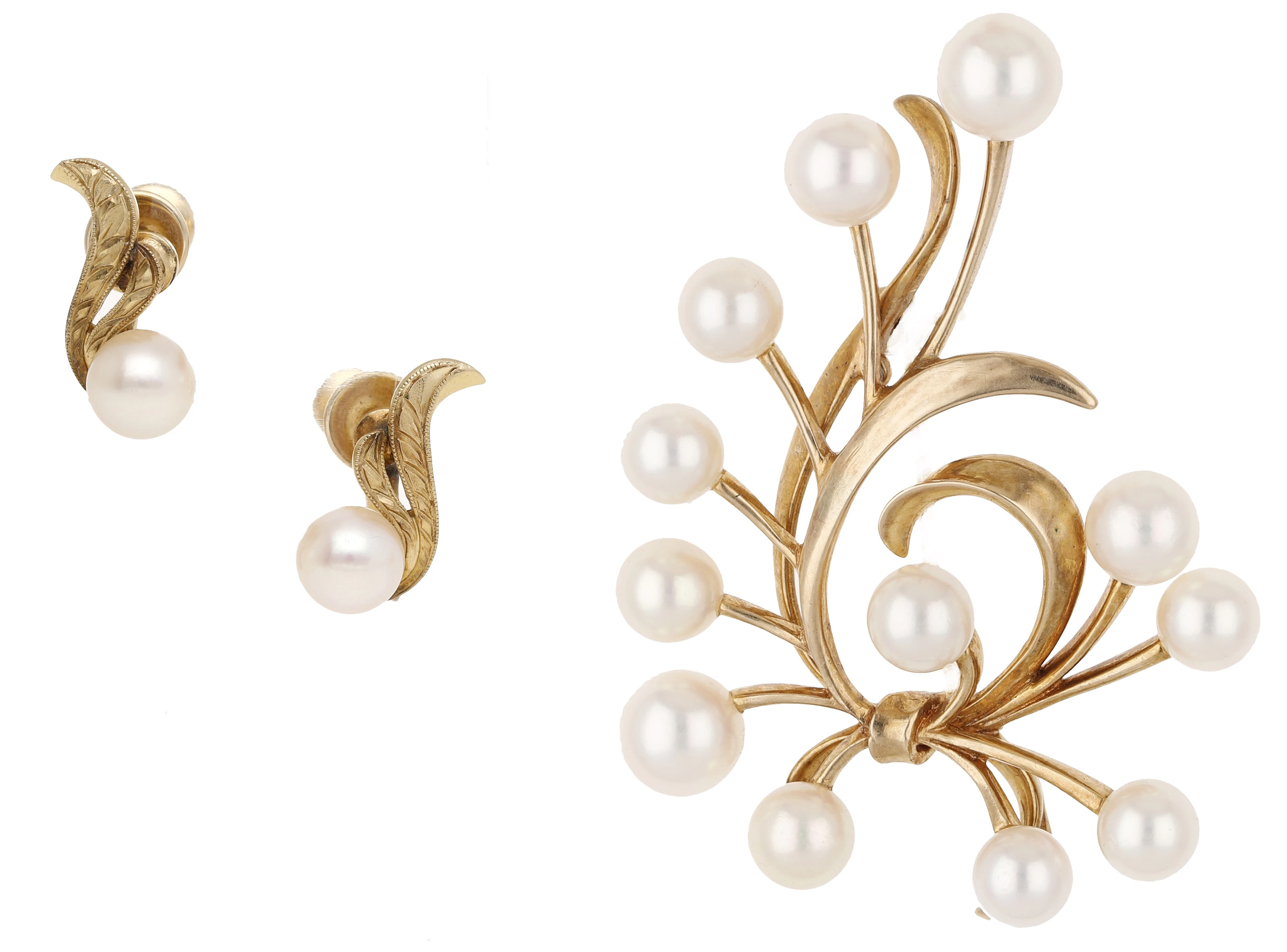 A cultured pearl brooch and pair of ear clips by Mikimoto, the stylised