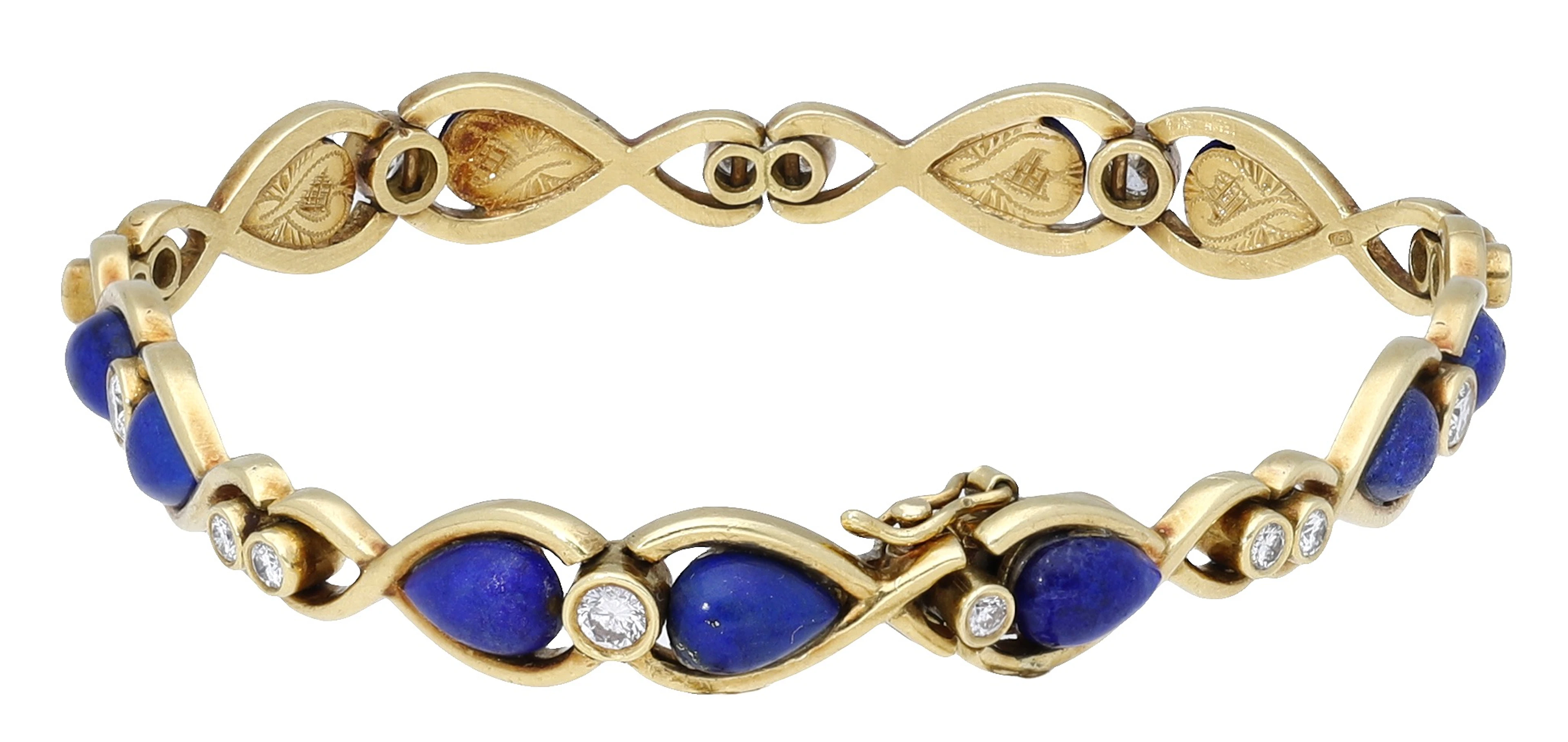 An 18ct gold lapis lazuli and diamond bracelet, circa 1984, the stylised