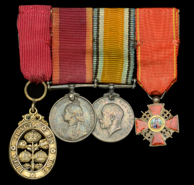 A Great War ‘Civil Division’ C.B. mounted group of four miniature