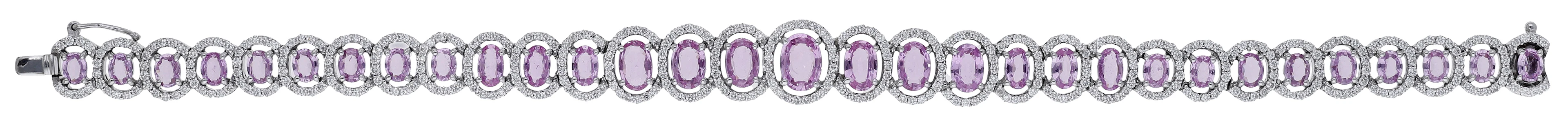 A pink sapphire and diamond cluster bracelet, the graduated oval mixed-cut