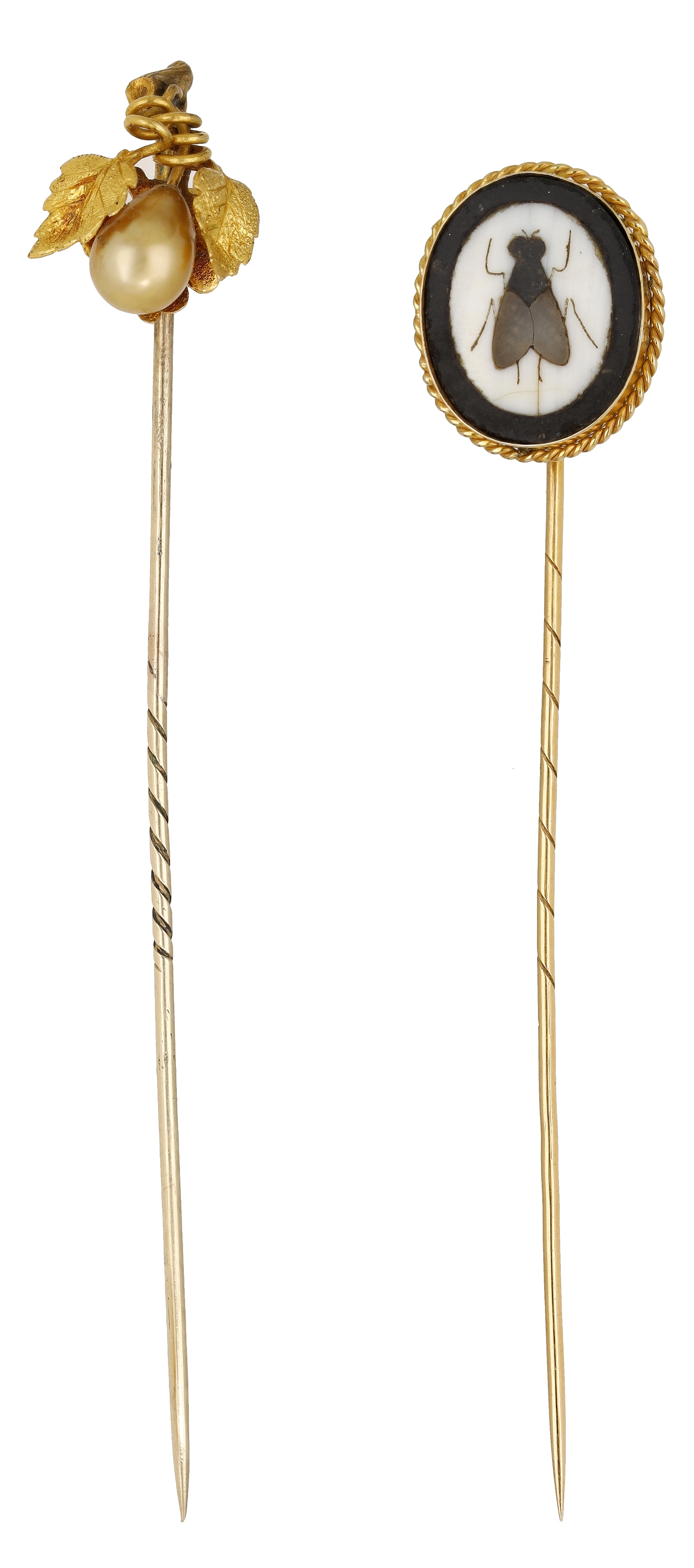 Two antique stickpins, the first with engraved leaves and scrolling