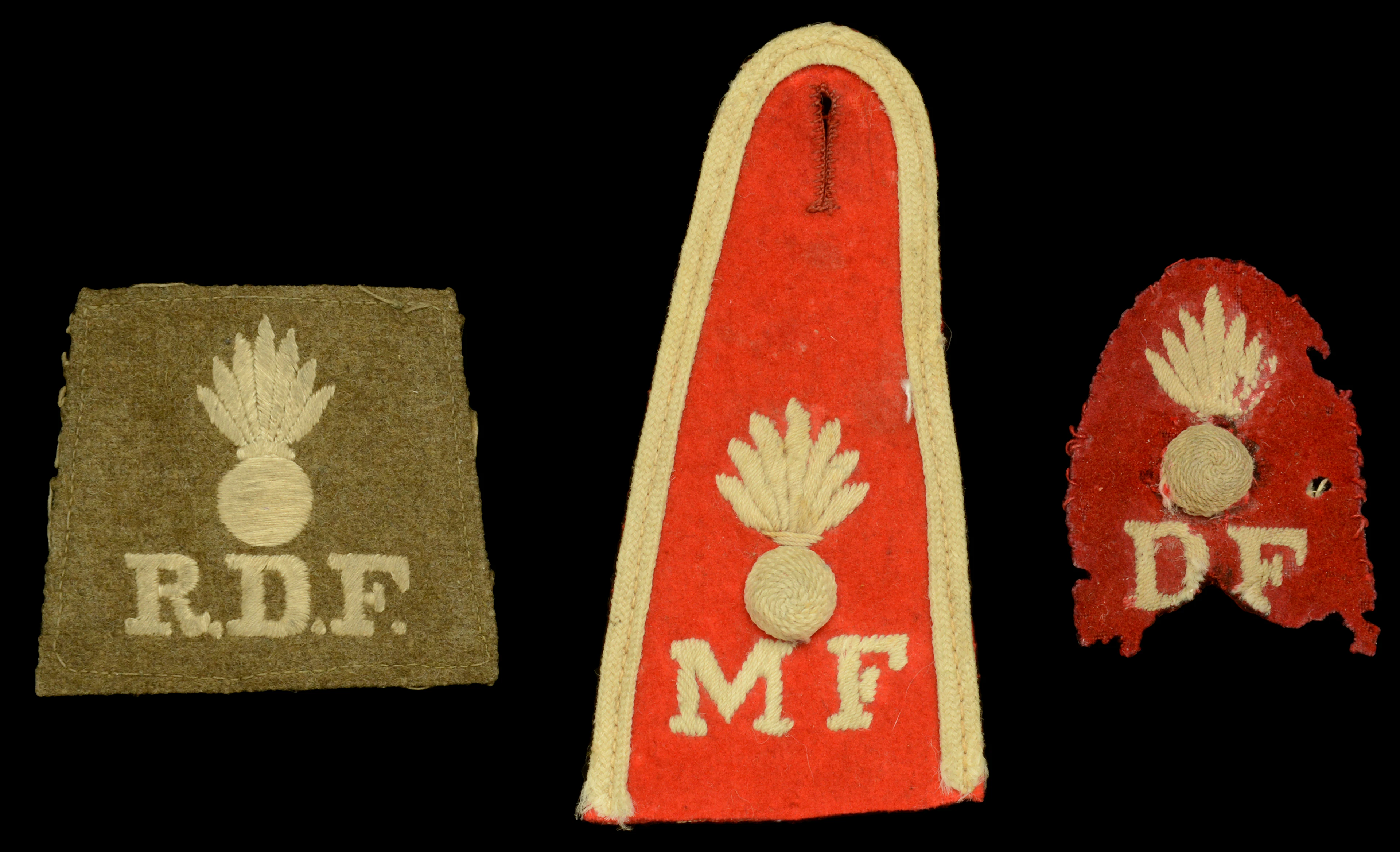 Assorted Dublin, Royal Dublin and Munster Fusiliers Cloth Insignia.
