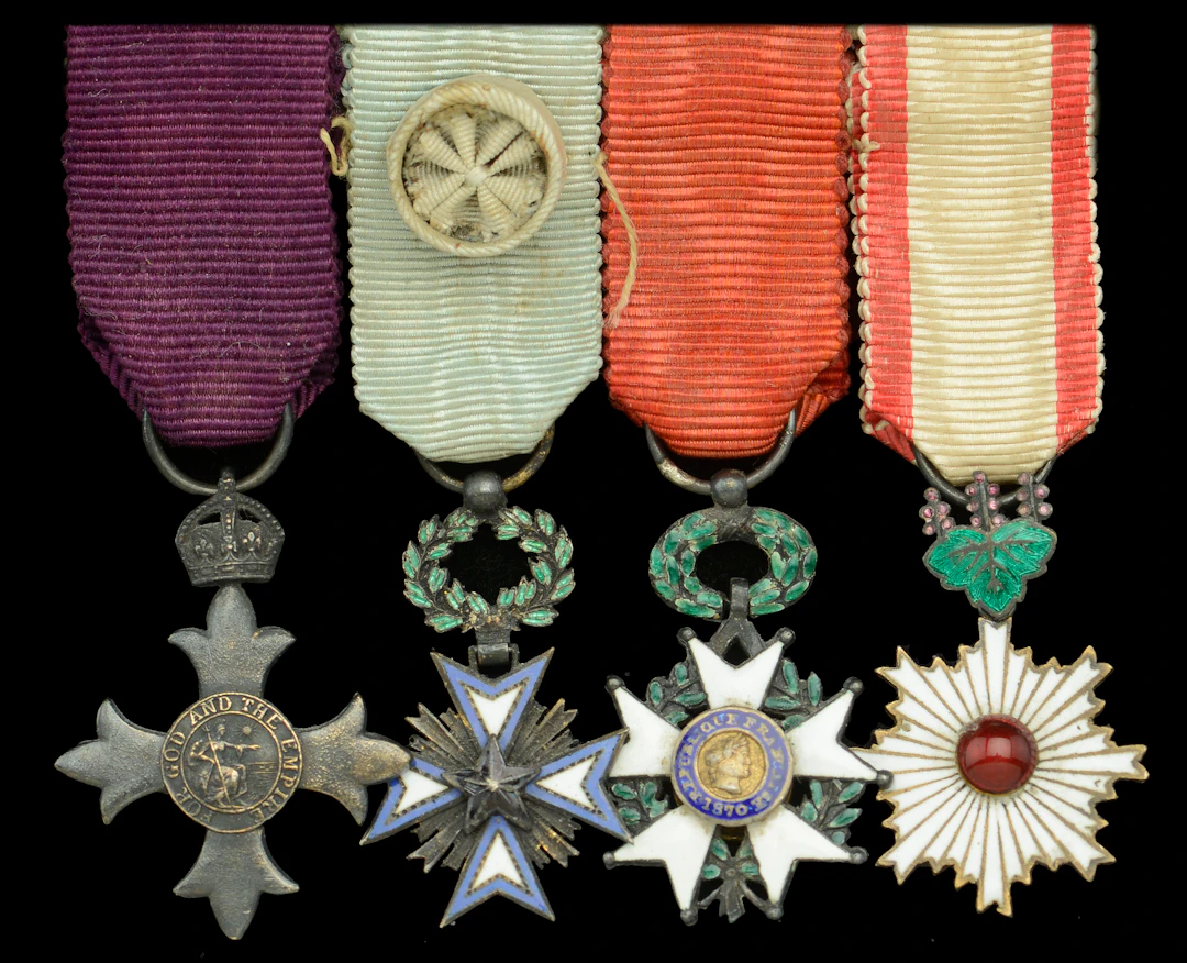 A Great War ‘Civil Division’ O.B.E. mounted group of four miniature