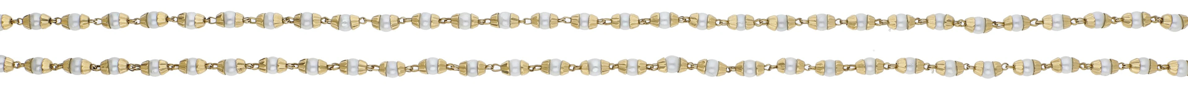 A cultured pearl set necklace, composed of small cultured pearls each