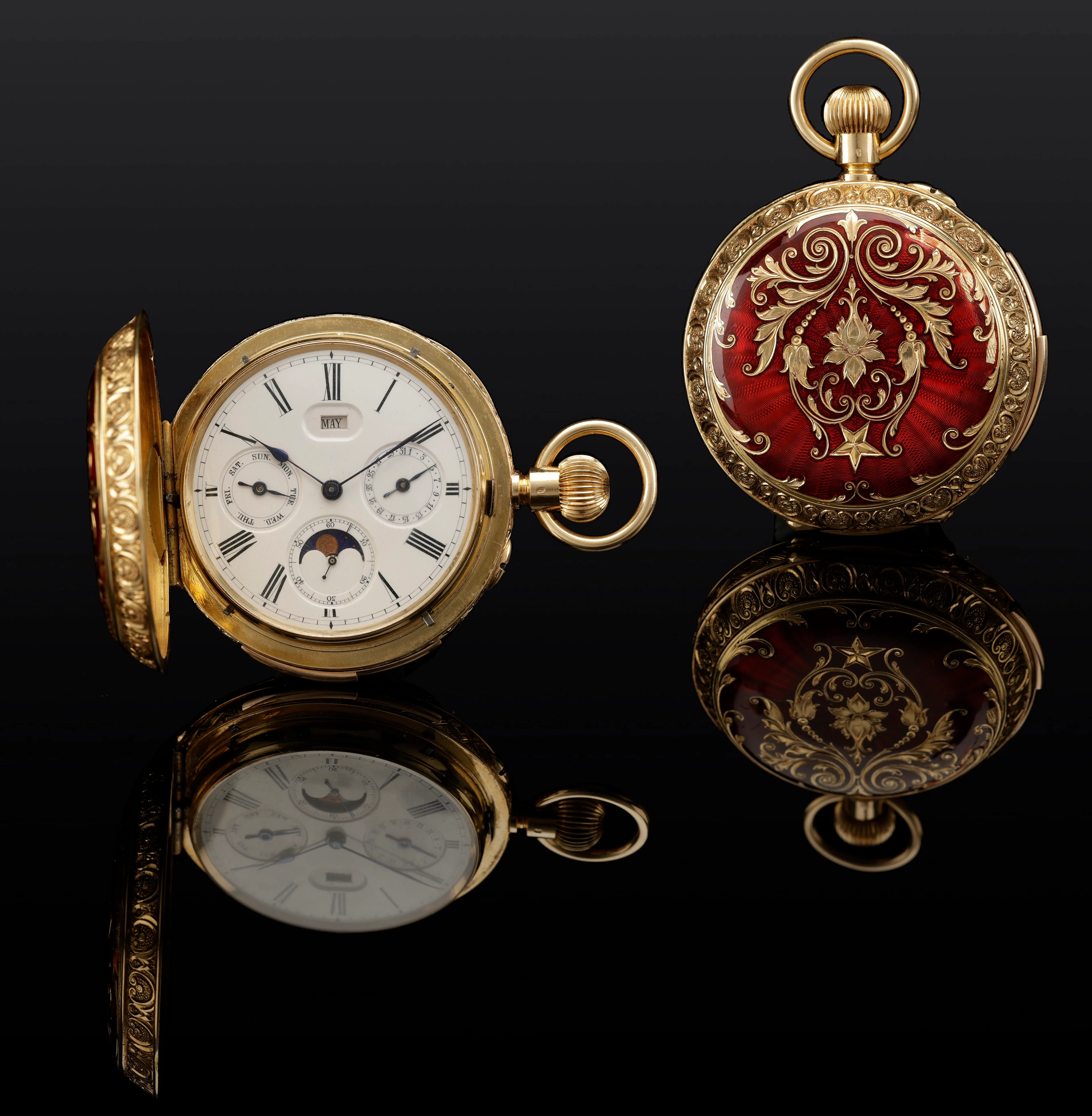 Swiss. A gold and enamel hunting cased keyless minute repeating calendar