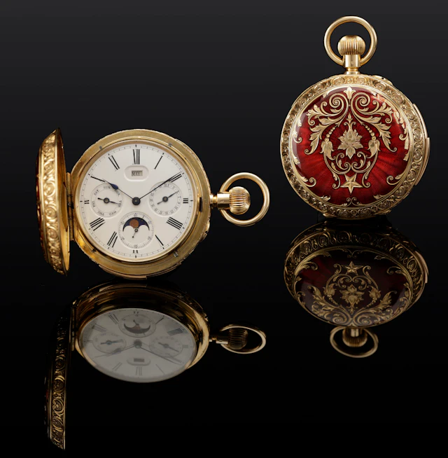 Swiss. A gold and enamel hunting cased keyless minute repeating calendar