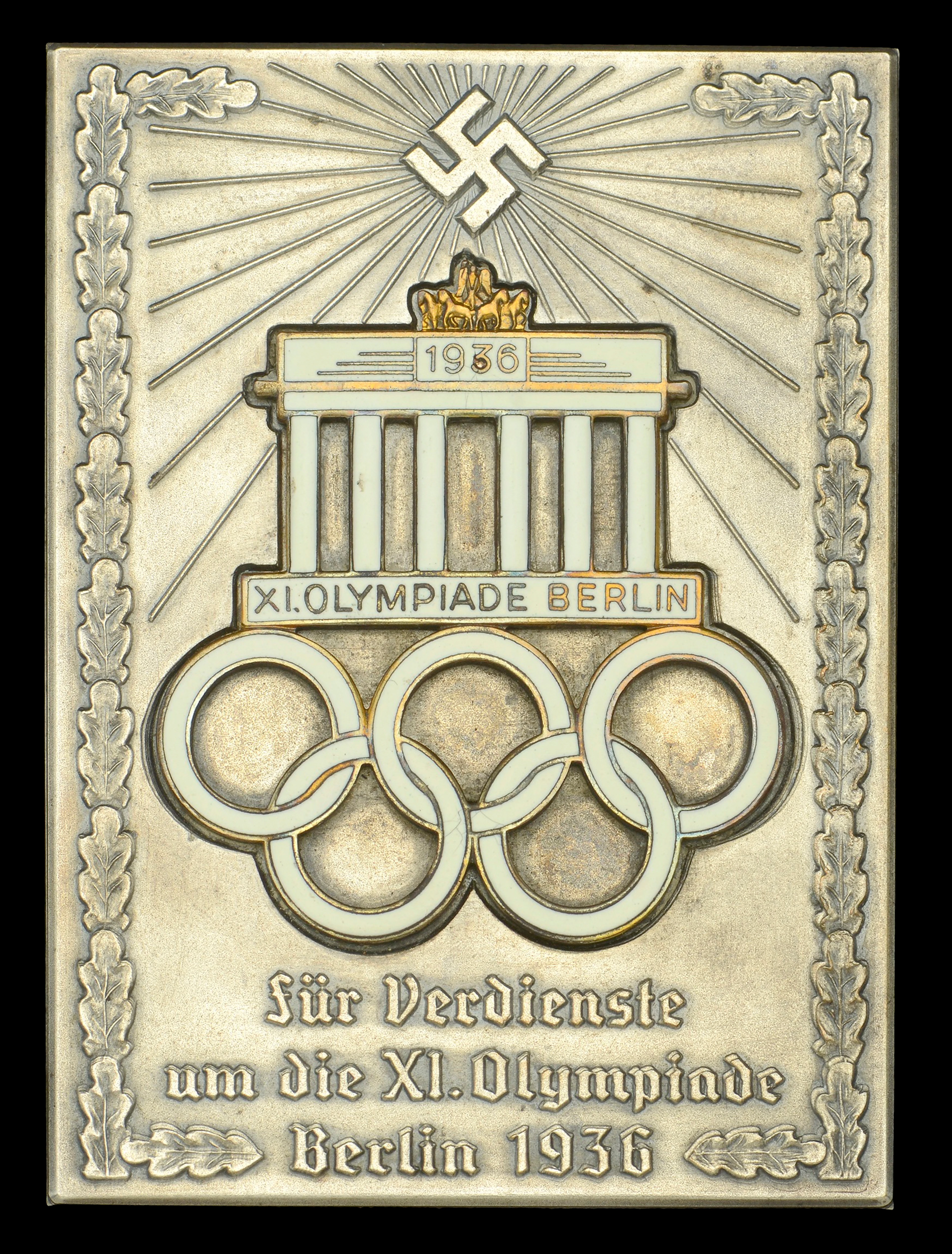 The official award plaque presented to Mr. John Wells for his services
