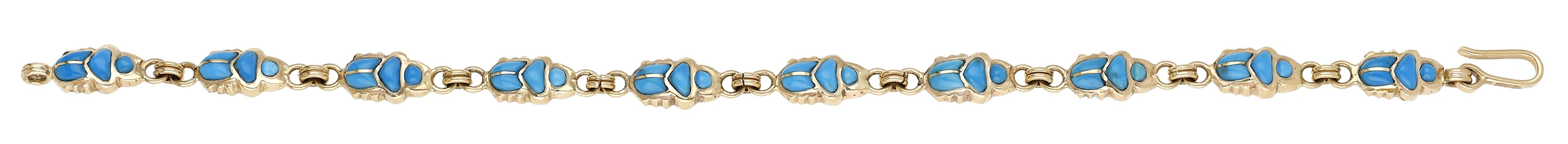 A bracelet, set with links of scarab design, inset with turquoise-coloured