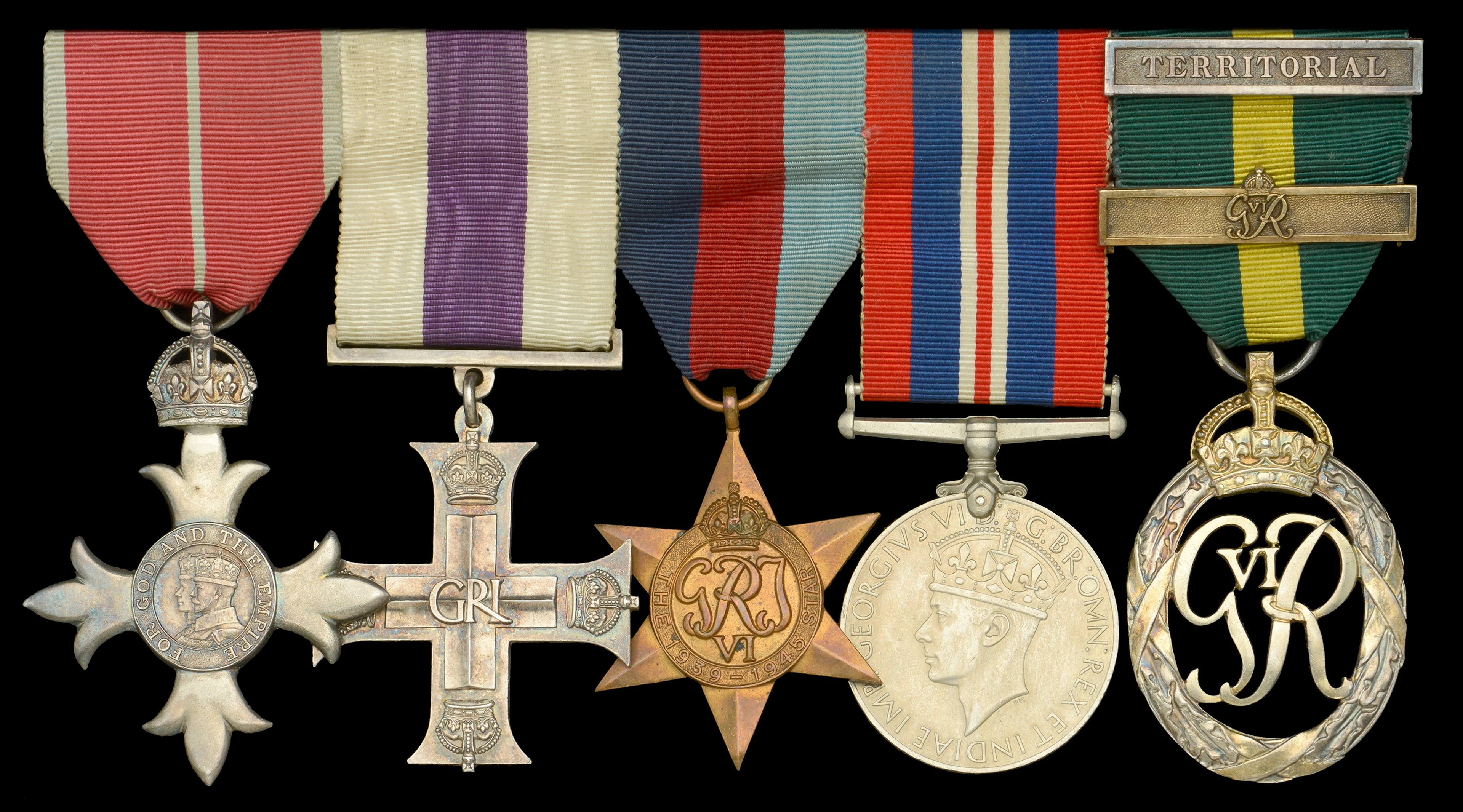 A rare Second War ‘Prisoner of War’ M.B.E., ‘Defence of Calais’ M.C.