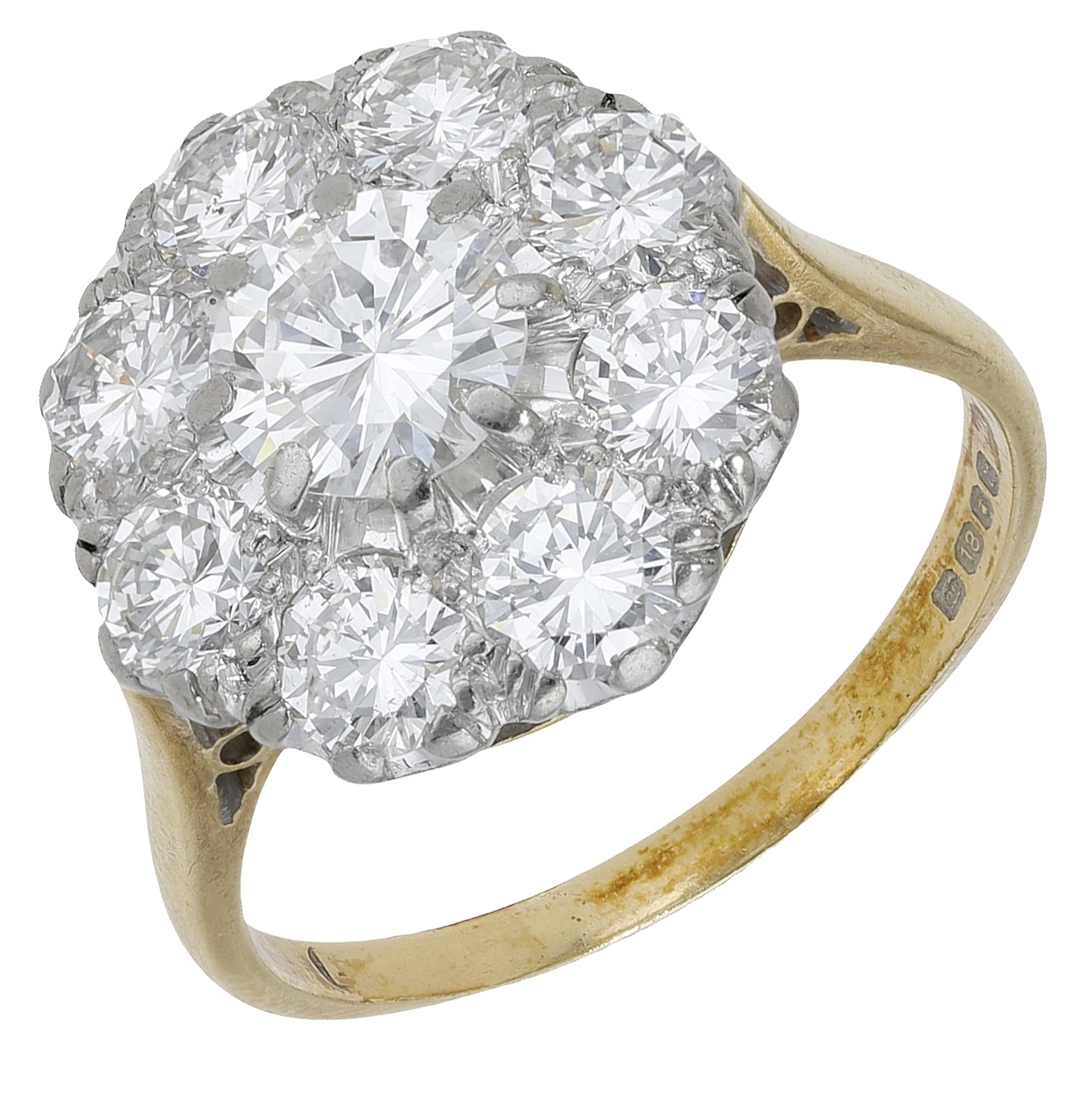 An 18ct gold and diamond cluster ring, 1972, the brilliant-cut diamond