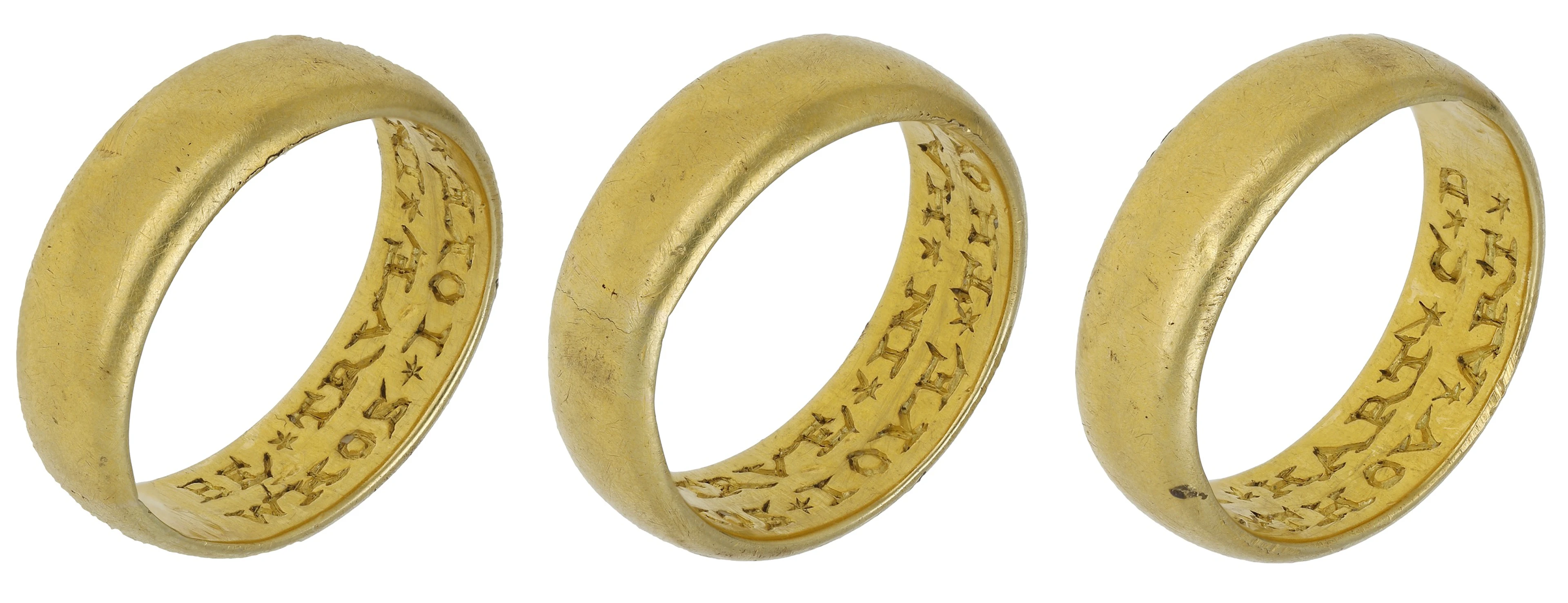 A gold posy ring, AD. 1550-1650, the broad plain band engraved to