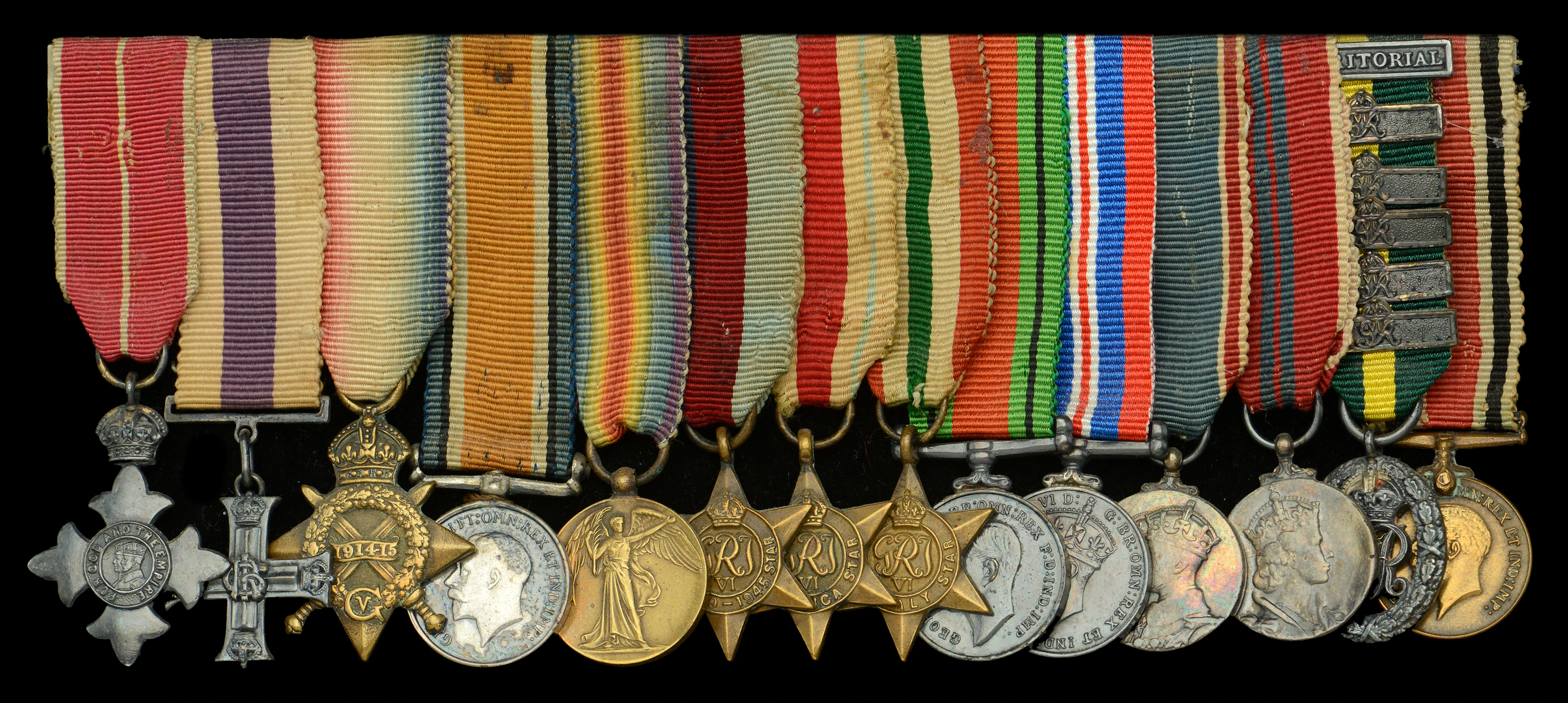 A Second War O.B.E., Great War M.C. mounted group of fourteen miniature