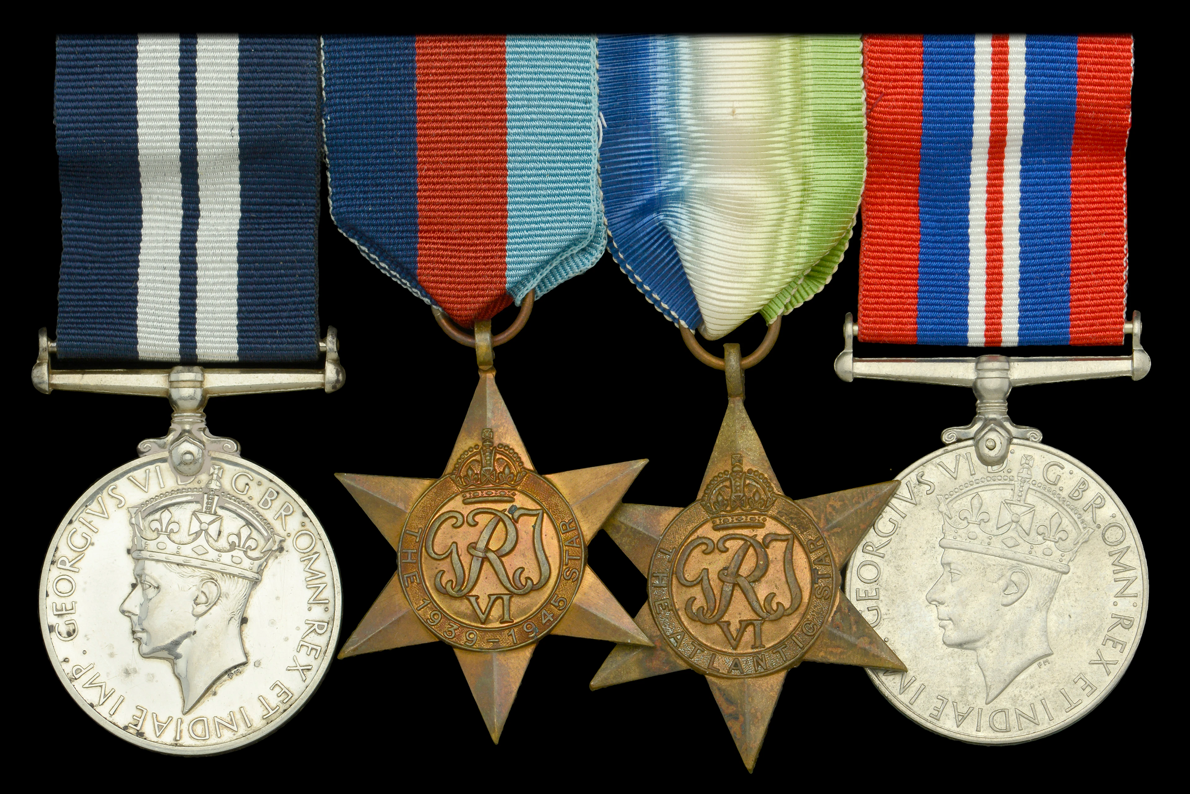 A Second War D.E.M.S. gunner’s D.S.M. group of four awarded to Acting