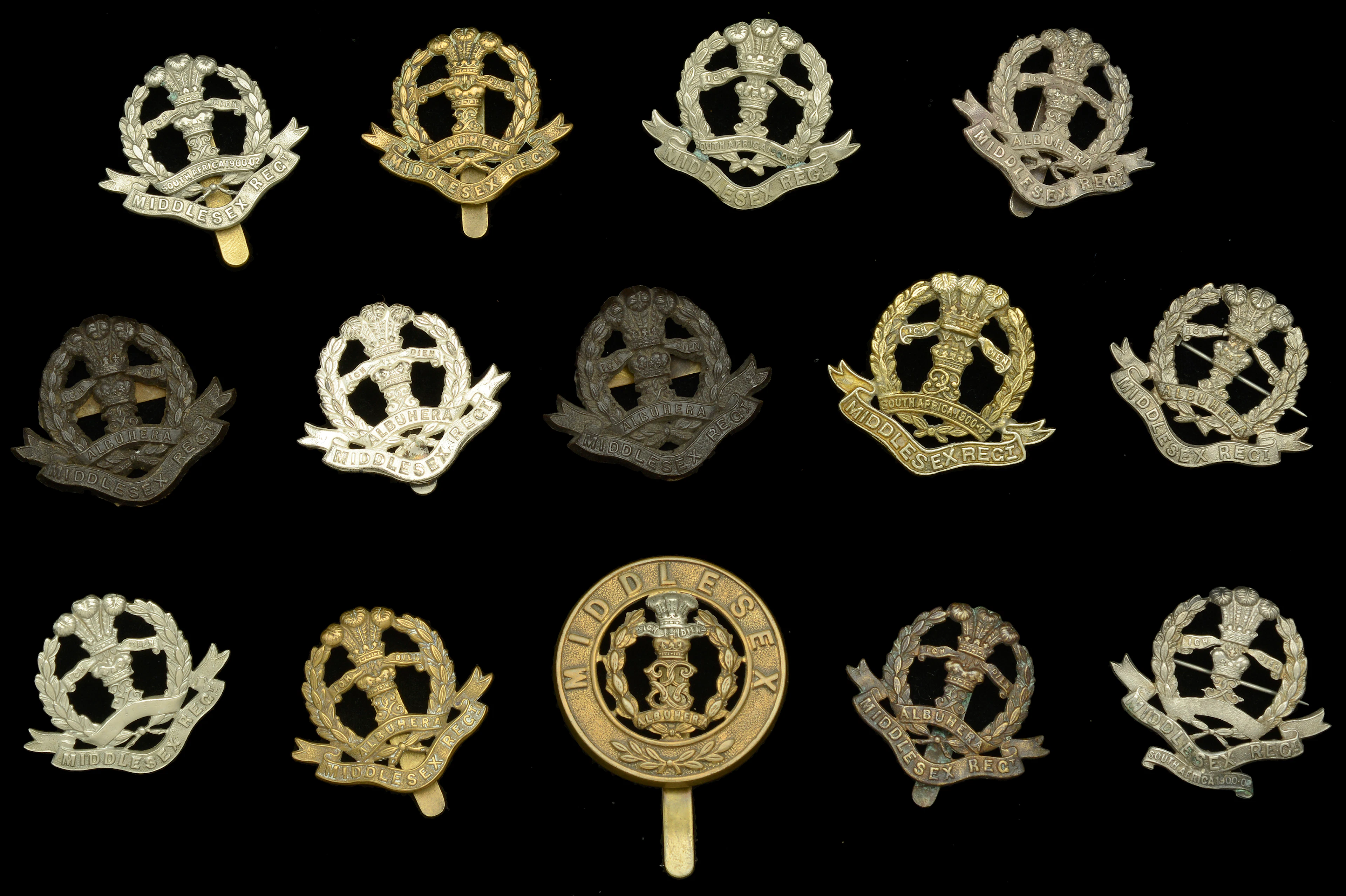 Middlesex Regiment assorted Cap Insignia. A good selection with Regular