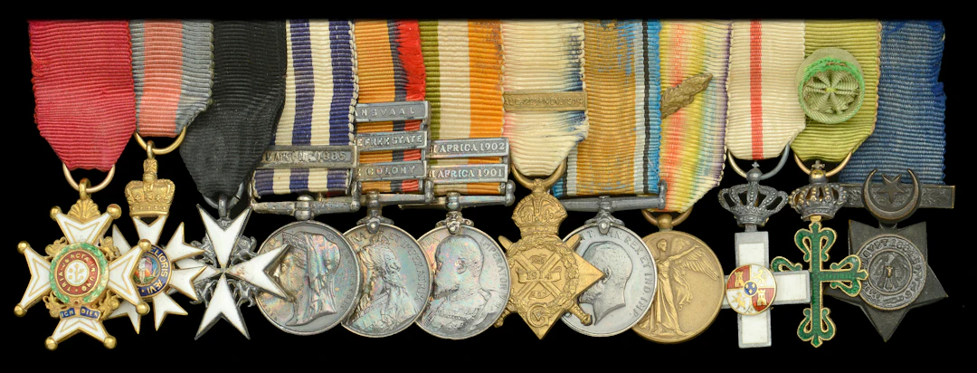 A fine pre-War C.B., Great War C.M.G. mounted group of twelve miniature