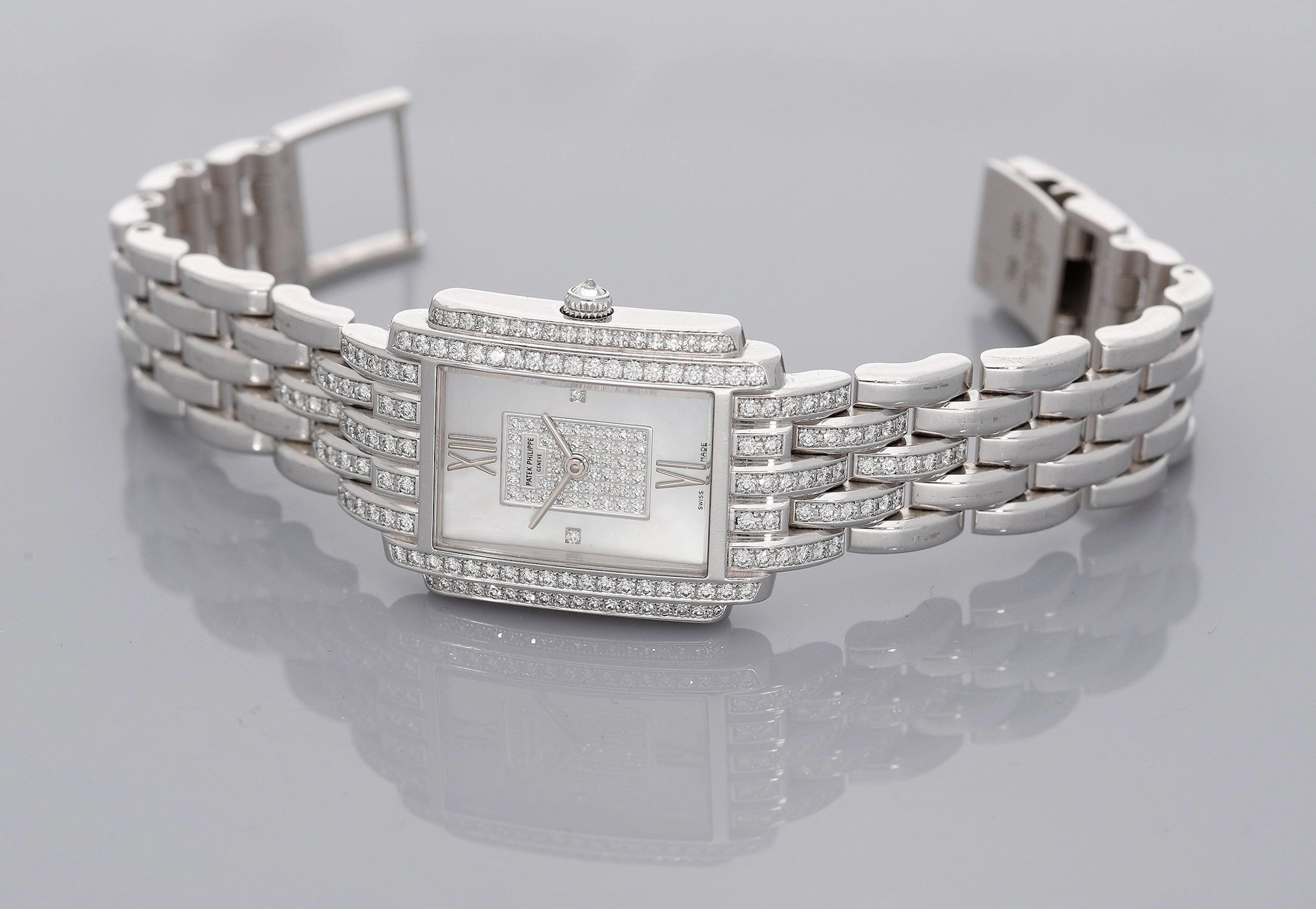 Patek Philippe. A lady’s white gold and diamond-set rectangular bracelet