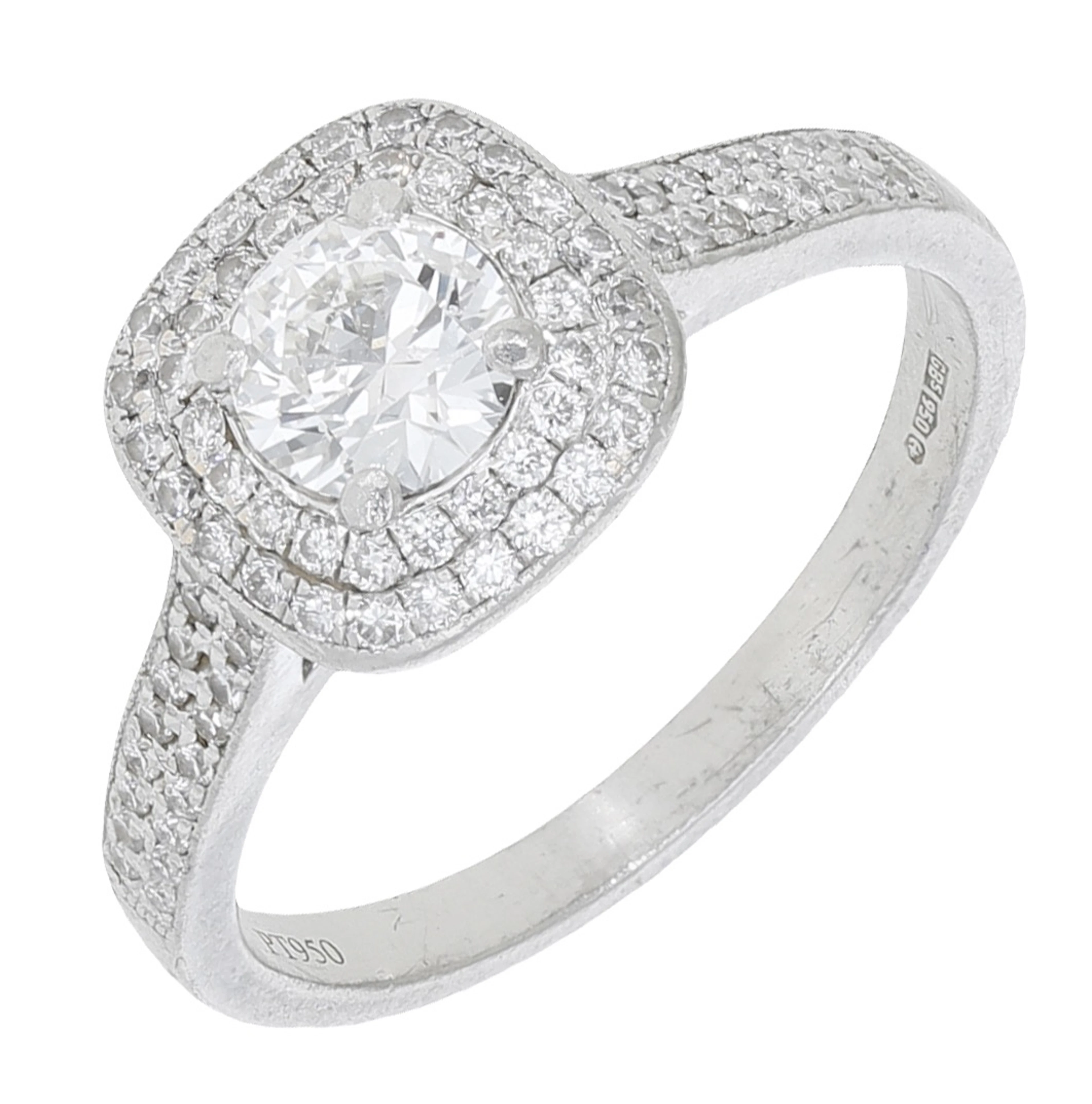 A diamond and platinum cluster ring, the central brilliant-cut diamond