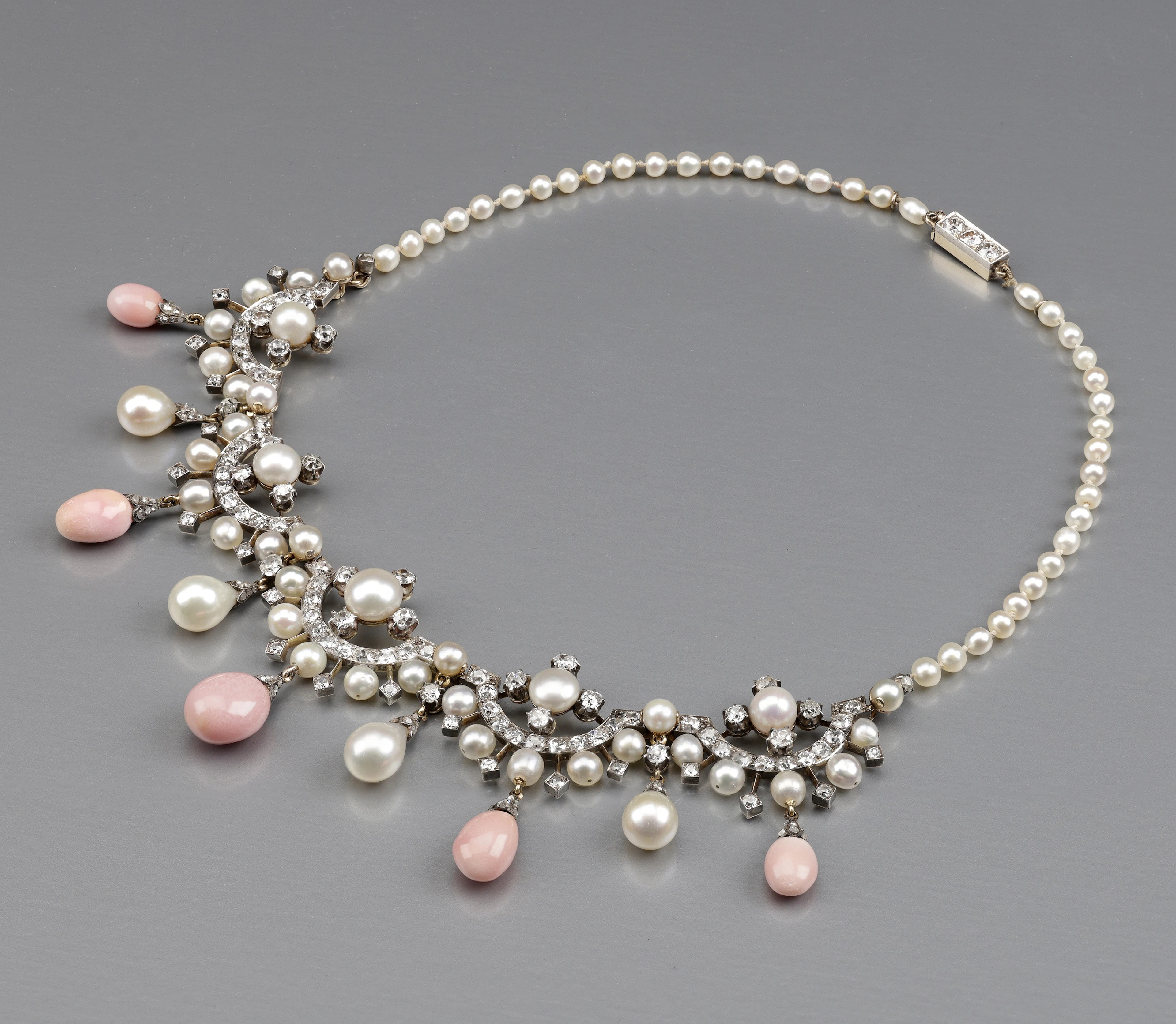 A natural pearl, conch pearl and diamond fringe necklace, circa 1890