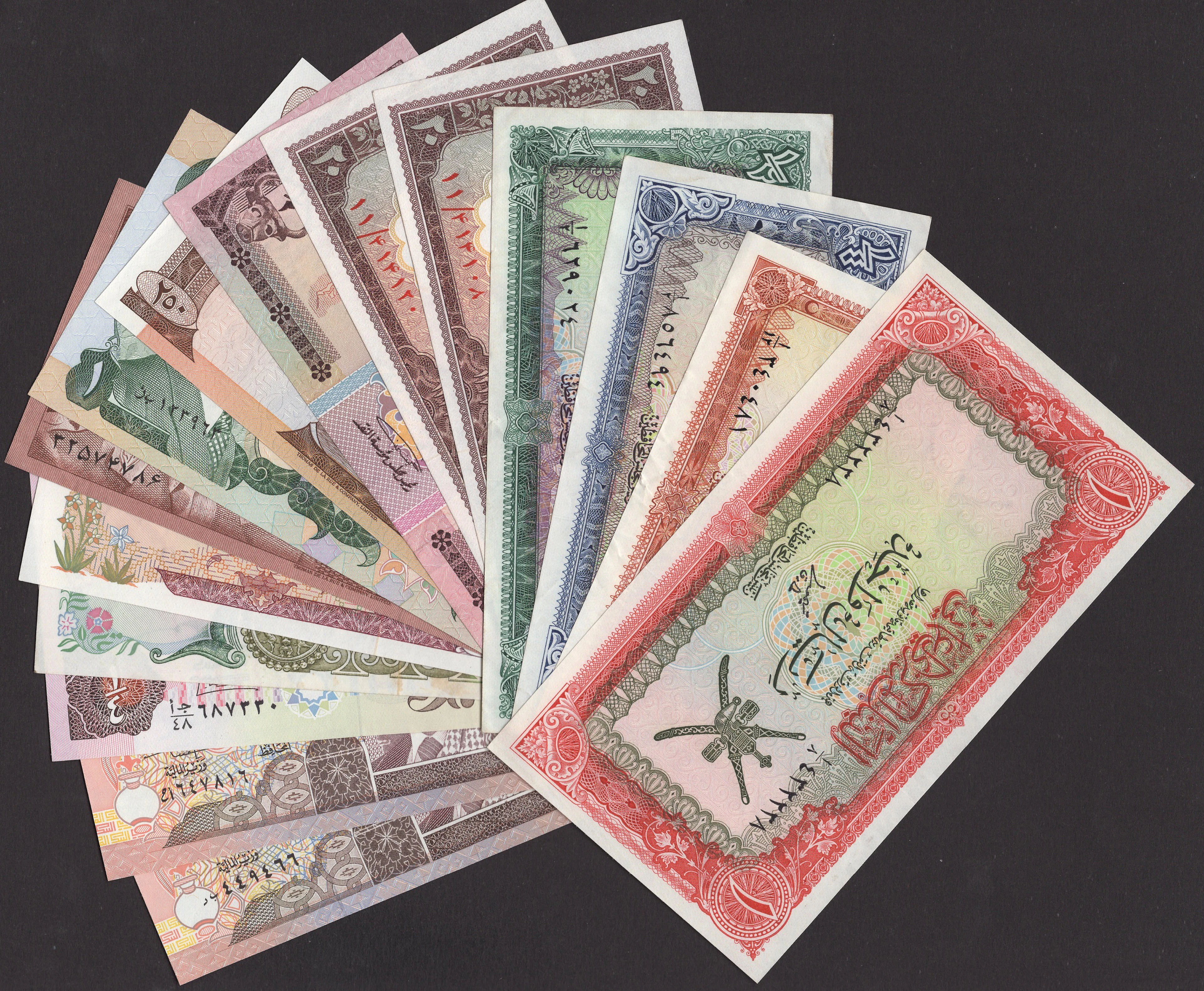 A small group of predominantly Middle Eastern banknotes, comprising