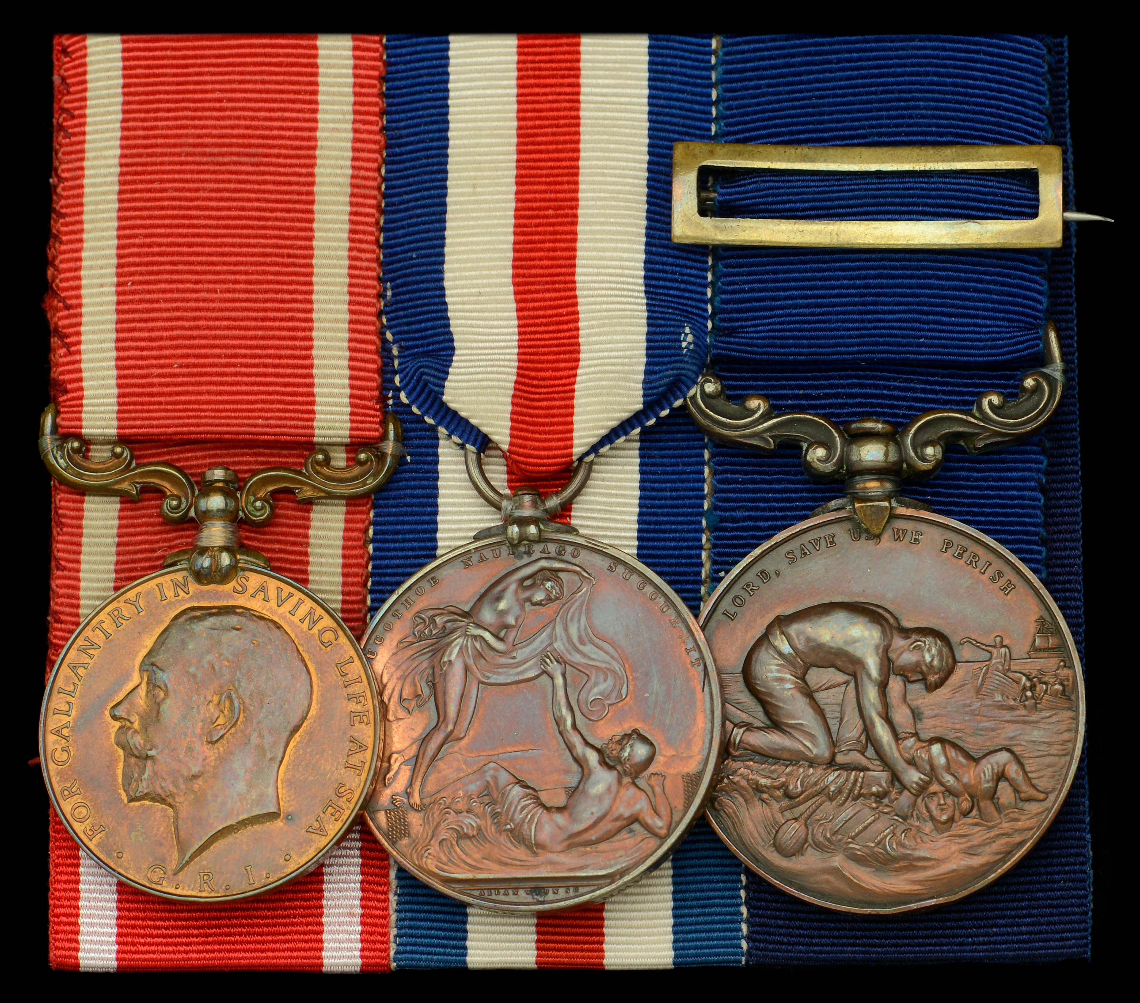 A fine S.G.M. group of three awarded to Able Seaman W. J. Lawry, Mercantile