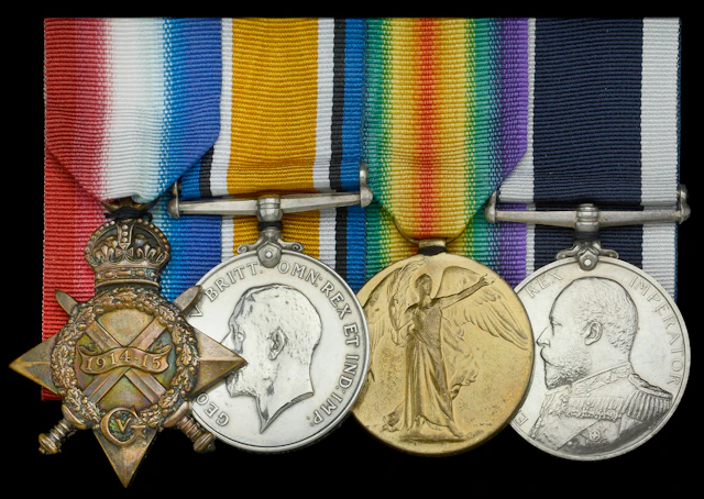 Four: Master at Arms G. H. Newton, Royal Navy, who served in H.M.S.