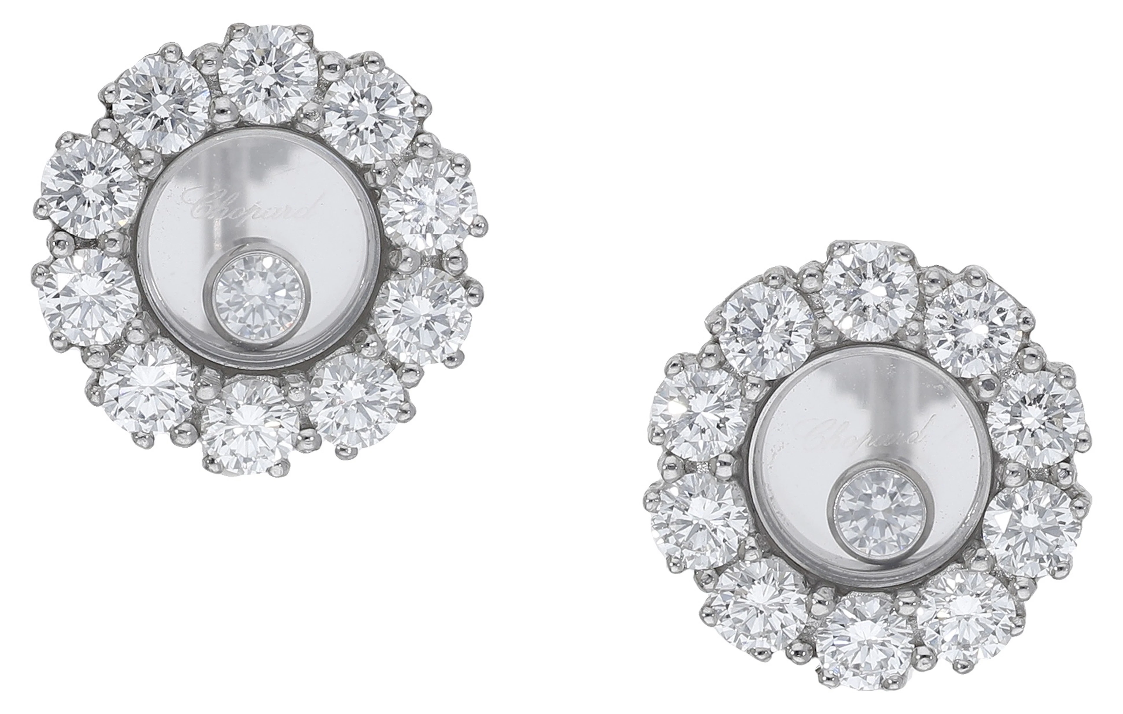 A pair of ‘Happy Diamond’ ear clips by Chopard, the circular plaques
