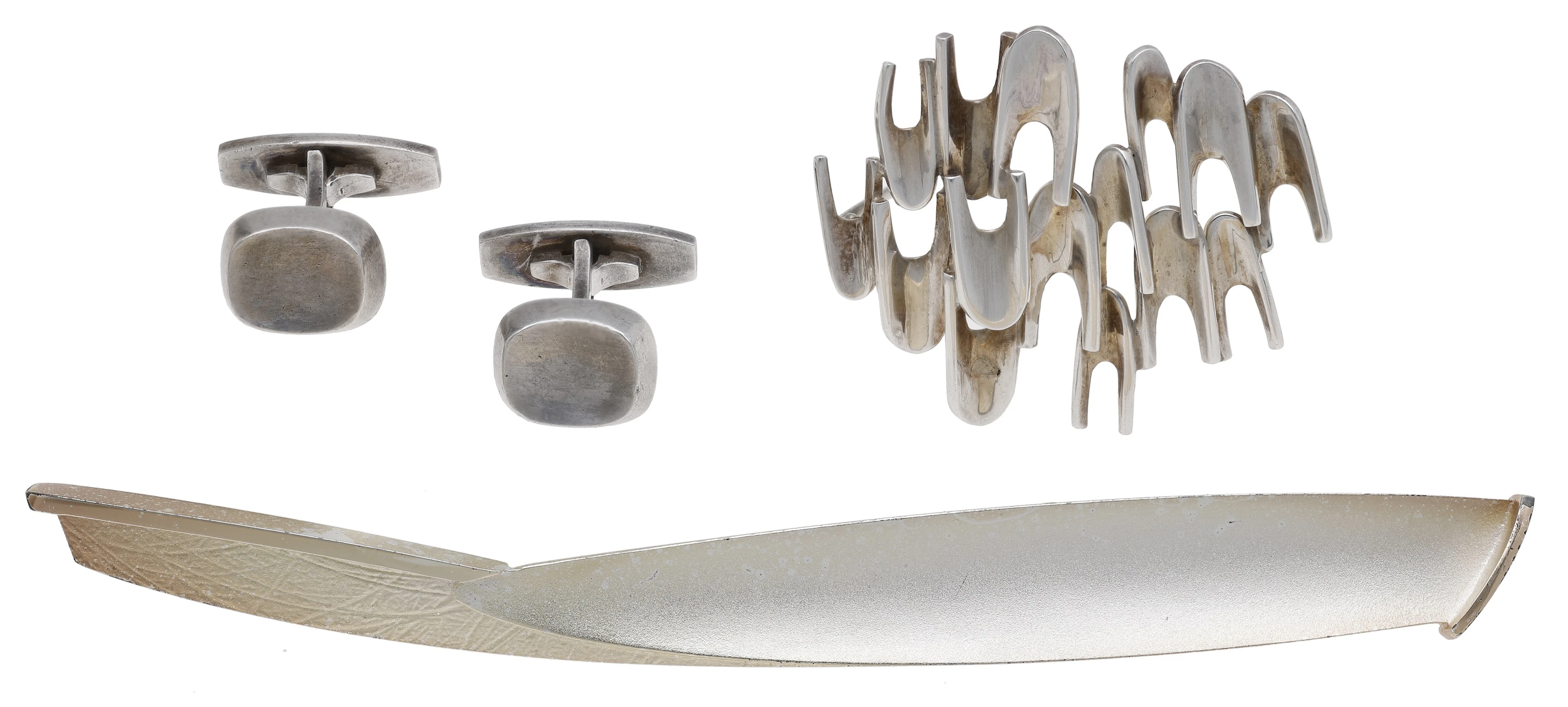 A silver abstract brooch by Ernest Blyth for Ivan Tarratt Ltd, composed