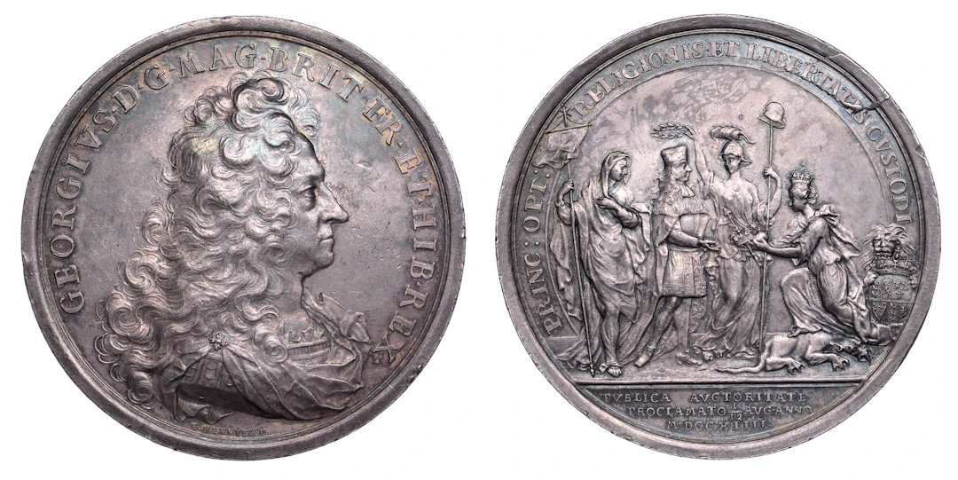 George I, Coronation, 1714, a large silver medal by E. Hannibal, draped