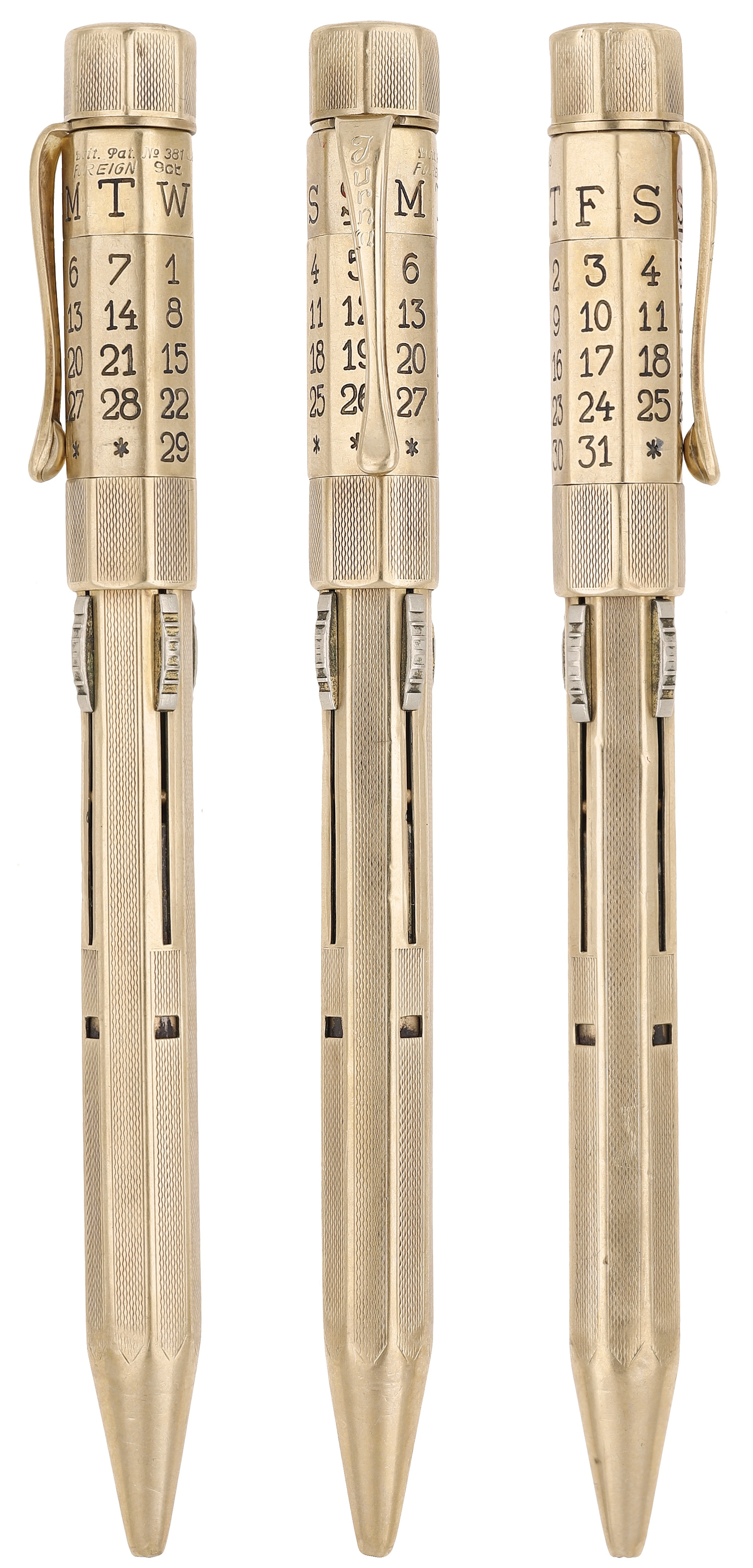 A mechanical calendar pencil, engine-turned, with four retractable